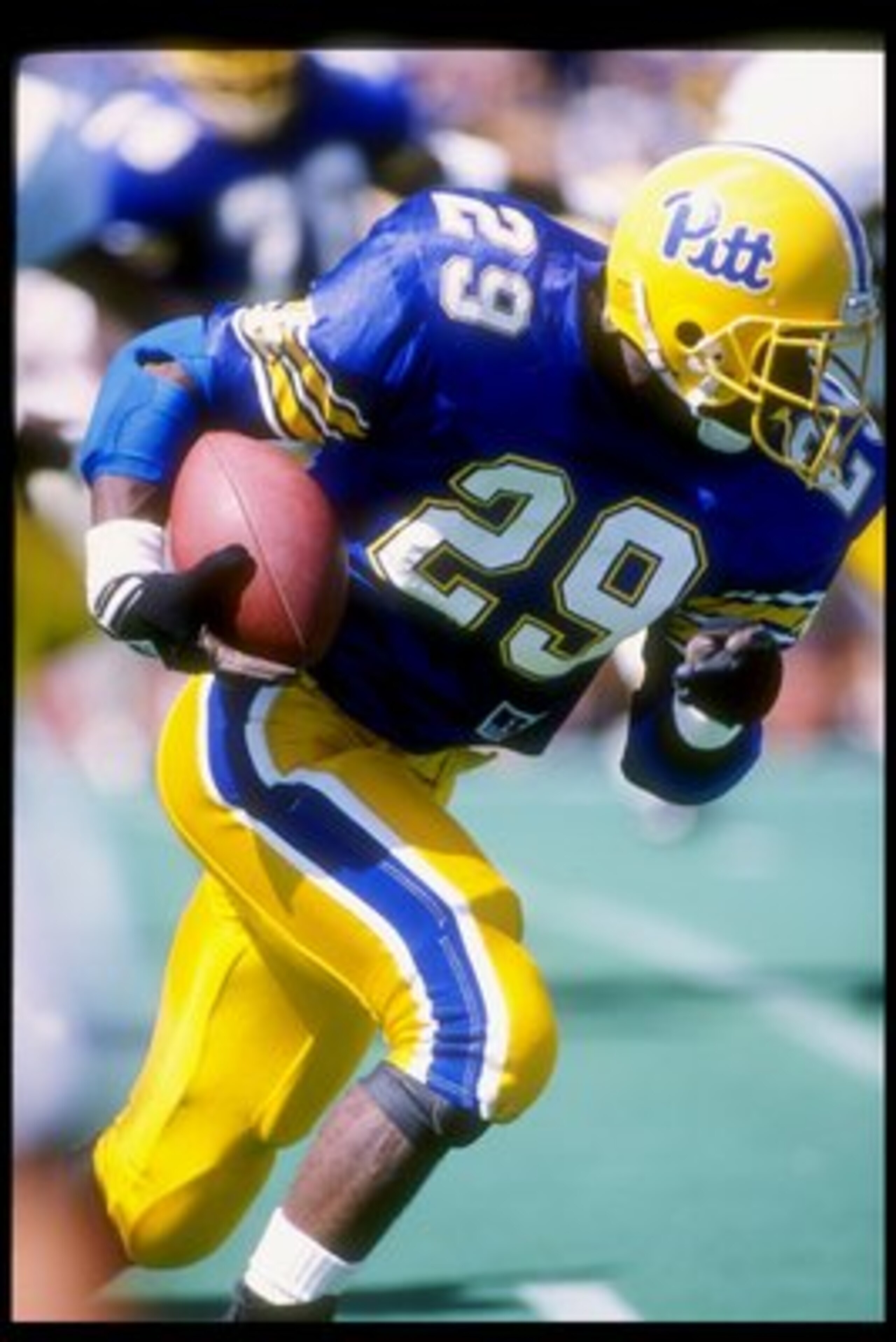 12 Sep 1992: Running back Curtis Martin of the Pittsburgh Panthers runs down the field during a game against the West Virginia Mountaineers at Pitt Stadium in Pittsburgh, Pennsylvania. West Virginia won the game 44-6.
