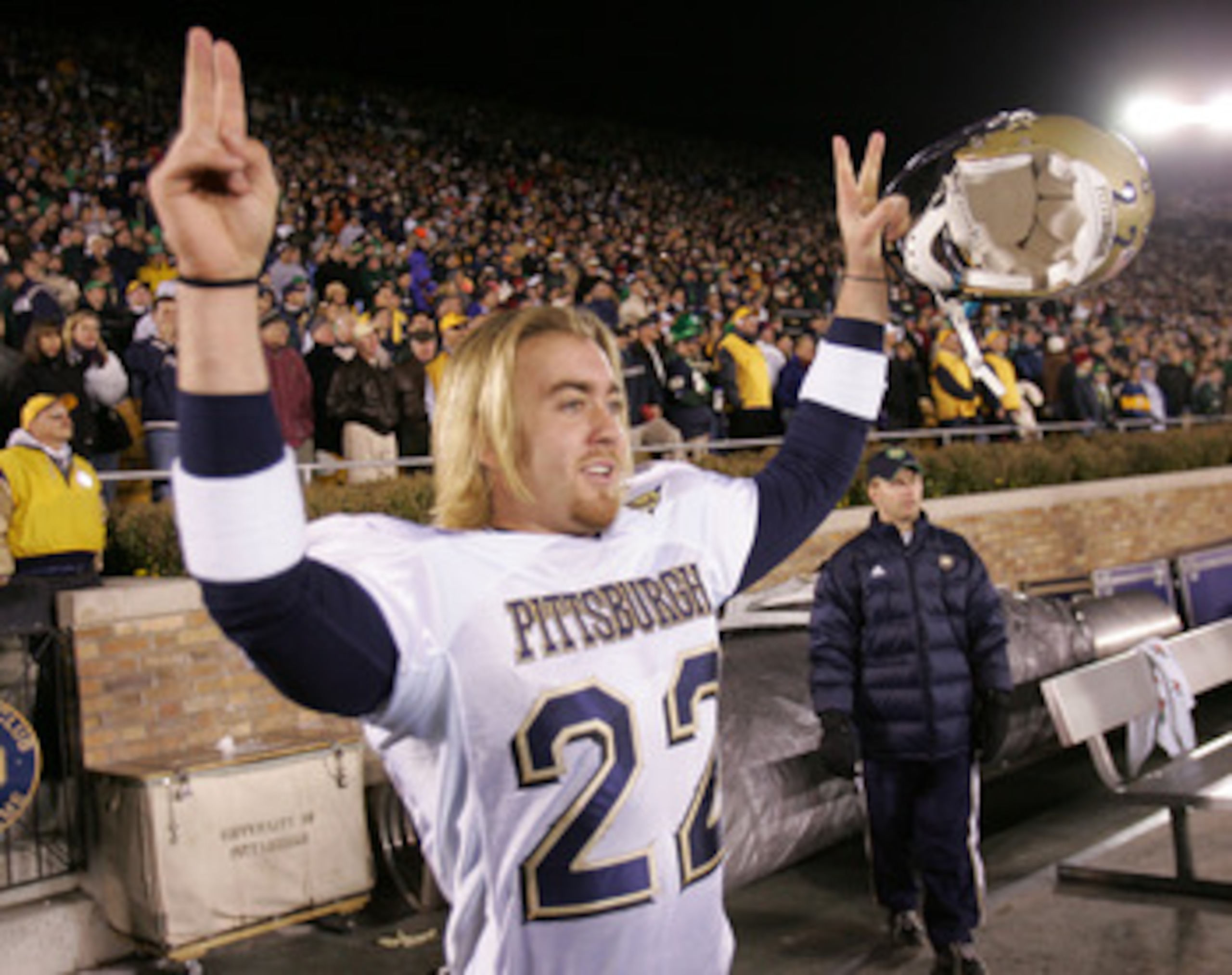 SOUTH BEND, IN - NOVEMBER 13: Kicker Josh Cummings #22 of Pittsburgh celebrates a win over Notre Dame after a game on November 13, 2004 at Notre Dame Stadium in South Bend, Indiana. Cummings kicked the game-winning field goal as Pittsburgh defeated Notre 