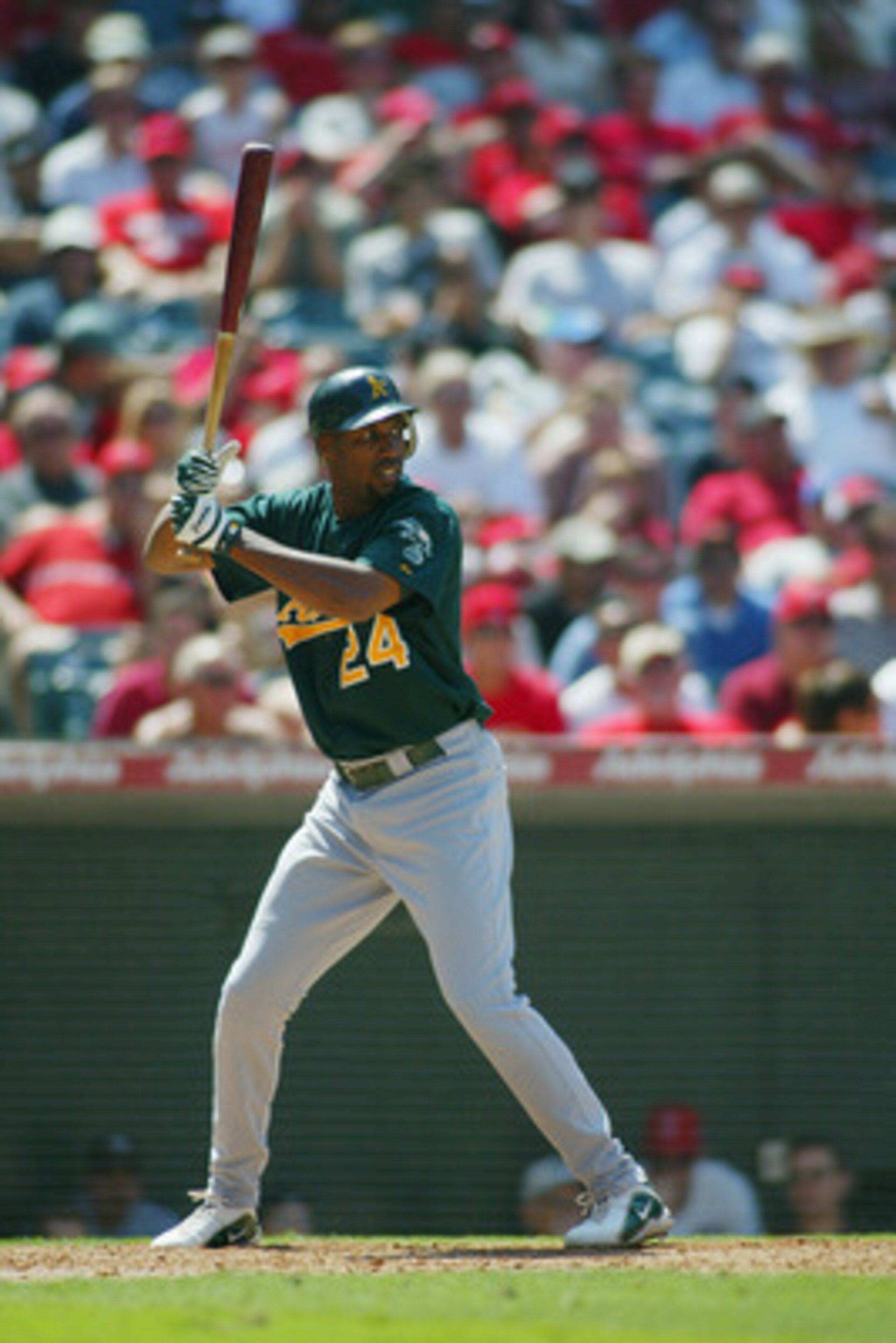 ANAHEIM, CA - JUNE 24:  Jermaine Dye #24?of the Oakland Athletics stands ready at bat during the game against the Anaheim Angels on June 24, 2004 at Angel Stadium in Anaheim, California. The Athletics won 2-1.  (Photo by Lisa Blumenfeld/Getty Images)