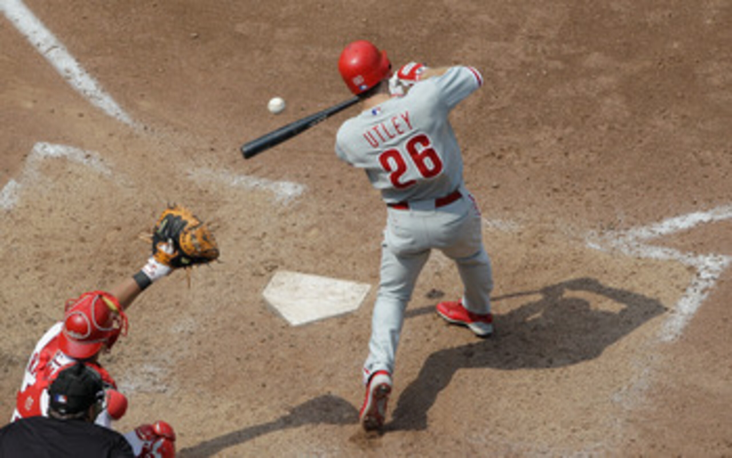 WASHINGTON, DC - JUNE 01: Chase Utley #26 of the Philadelphia Phillies fouls off a pitch to catcher Wilson Ramos #3 of the Washington Nationals during the seventh inning at Nationals Park on June 1, 2011 in Washington, DC.  (Photo by Rob Carr/Getty Images