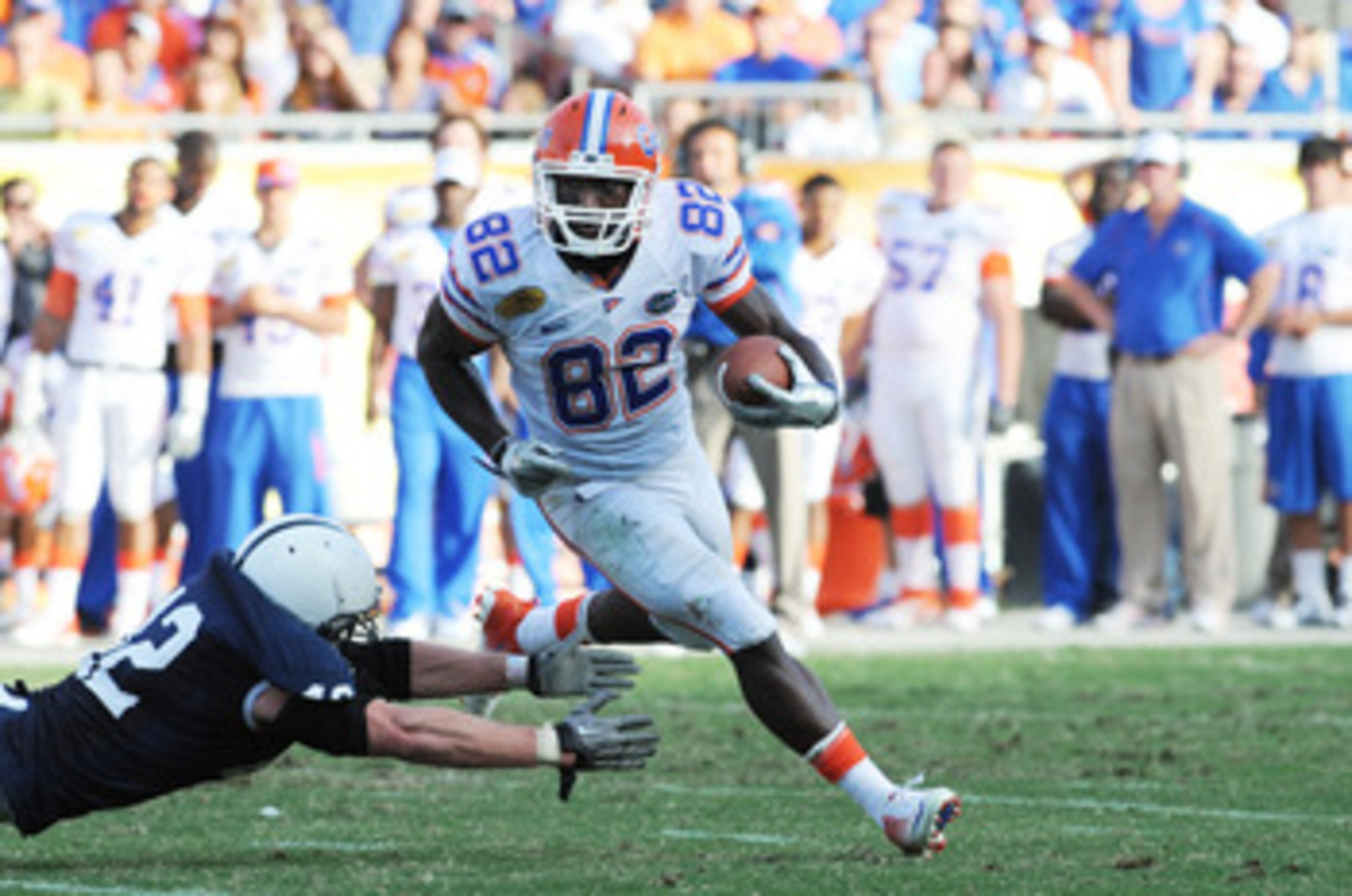 TAMPA, FL - JANUARY 1:  Wide receiver Omarius Hines #82 of the Florida Gators rushes upfield against the Penn State Nittany Lions January 1, 2010 in the 25th Outback Bowl at Raymond James Stadium in Tampa, Florida.  (Photo by Al Messerschmidt/Getty Images