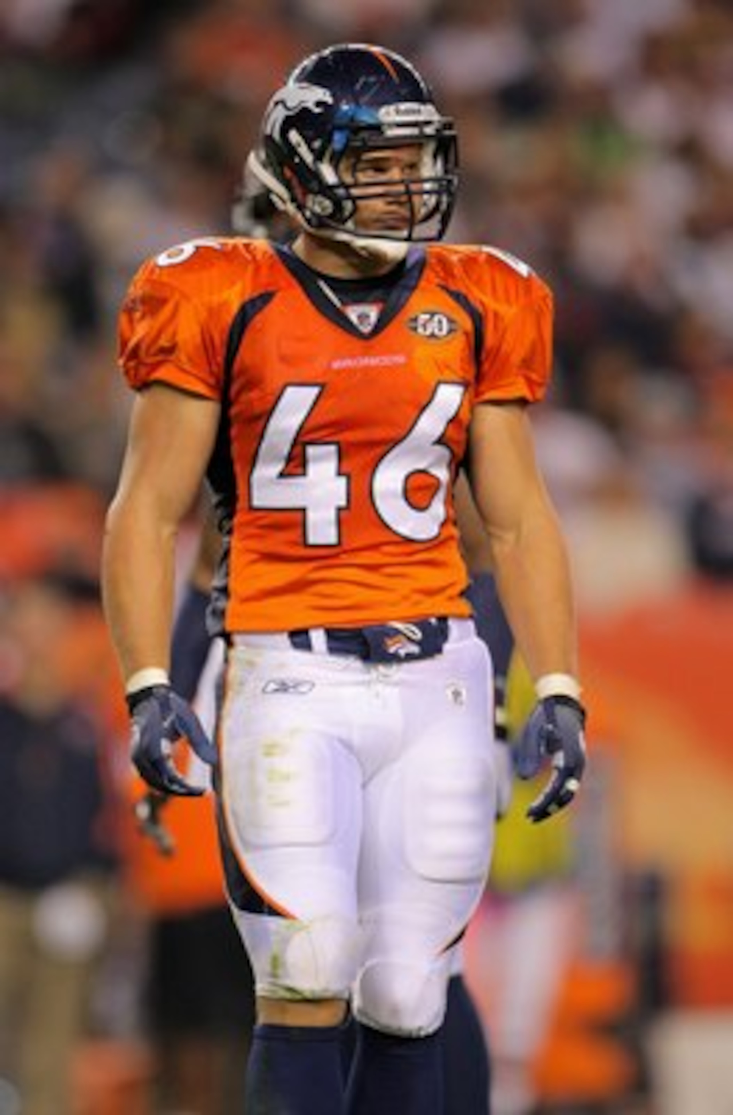 DENVER - AUGUST 30:  Linebacker Spencer Larson #46 of the Denver Broncos awaits action against the Chicago Bears during preseason NFL action at INVESCO Field at Mile High on August 30, 2009 in Denver, Colorado. The Bears defeated the Broncos 27-17.  (Phot