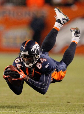DENVER - NOVEMBER 28:  A pass from Kyle Orton slips through the fingertips of wide receiver Brandon Lloyd #84 of the Denver Broncos during the fourth quarter against the St. Louis Rams at INVESCO Field at Mile High on November 28, 2010 in Denver, Colorado