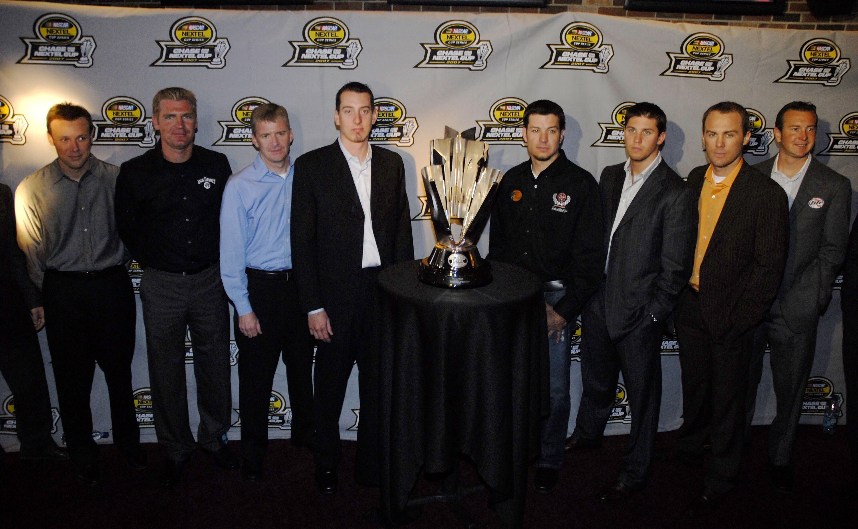 NEW YORK - SEPTEMBER 13:  NASCAR drivers pose with the NASCAR Nextel Cup trophy at the ESPN Zone on Chase Media Day September 13, 2007 in New York City.  (Photo by Jonathan Fickies/Getty Images for NASCAR)