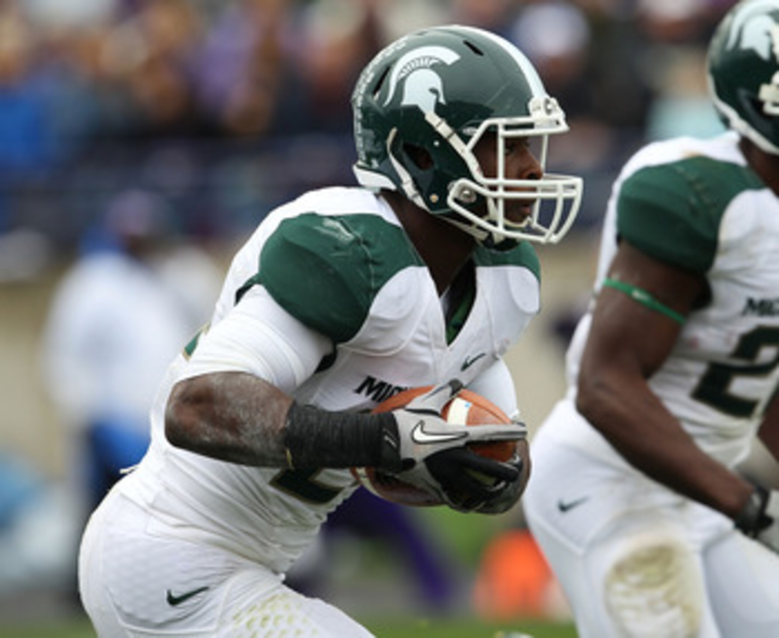 EVANSTON, IL - OCTOBER 23: Le'Veon Bell #24 of the Michigan State Spartans fields a kick-off against the Northwestern Wildcats at Ryan Field on October 23, 2010 in Evanston, Illinois. Michigan State defeated Northwestern 35-27. (Photo by Jonathan Daniel/G