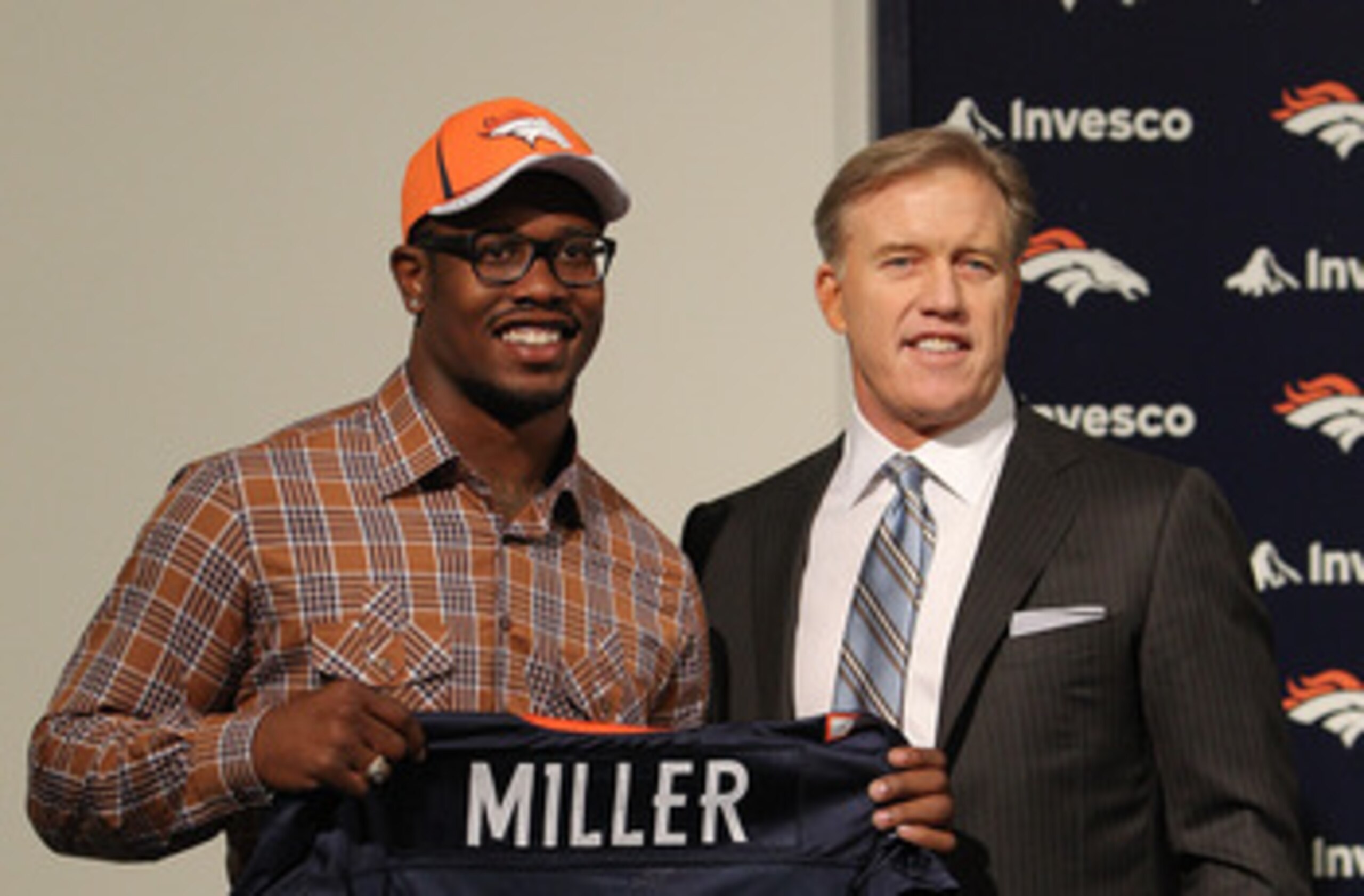 ENGLEWOOD, CO - APRIL 29: Von Miller of the Denver Broncos is presented to the media for the first time with vice president of football operations John Elway at Dove Valley on April 29, 2011 in Englewood, Colorado. Miller, a projected outside linebacker ENGLEWOOD, CO - APRIL 29: Von Miller of the Denver Broncos is presented to the media for the first time with vice president of football operations John Elway at Dove Valley on April 29, 2011 in Englewood, Colorado. Miller, a projected outside linebacker