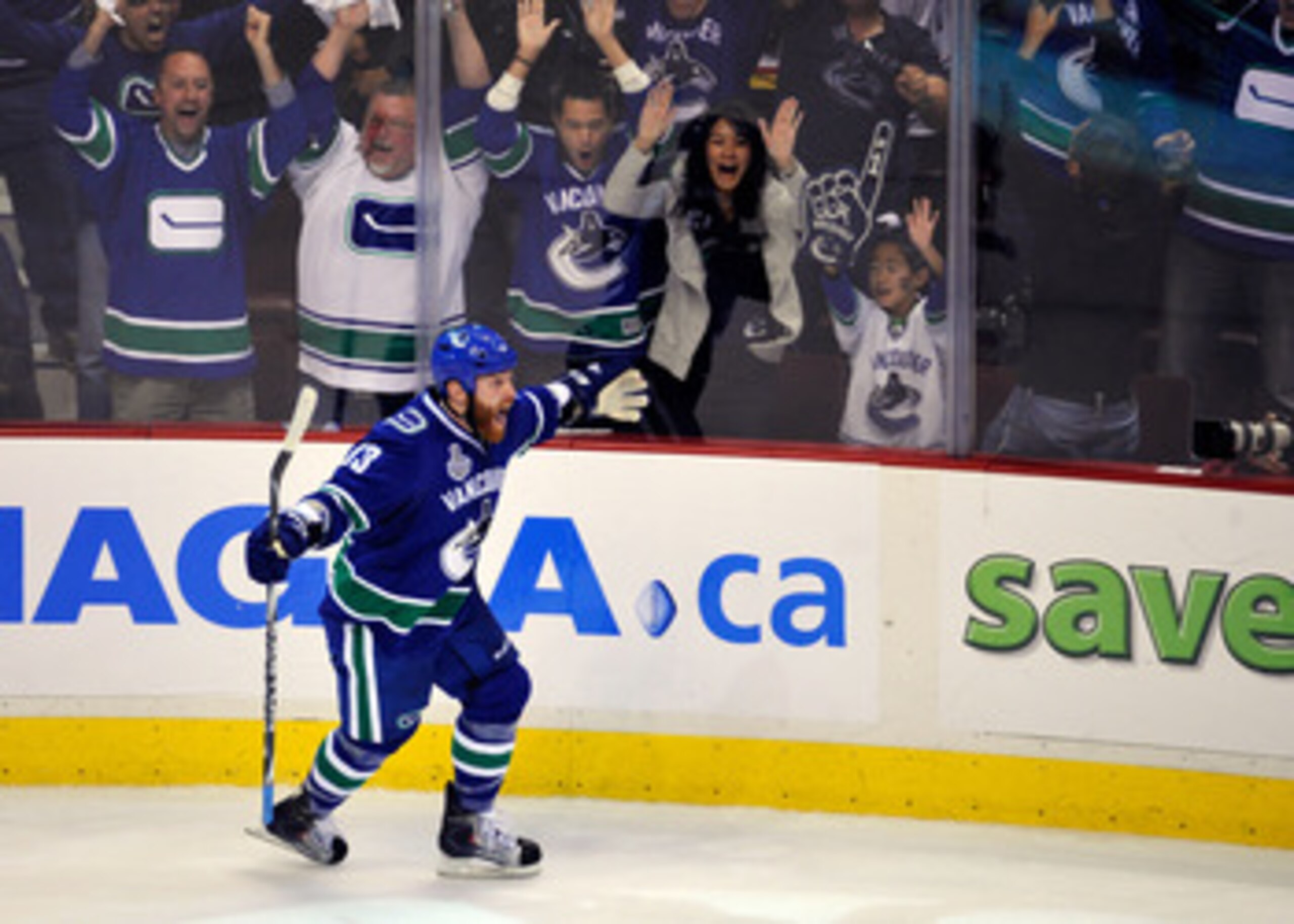VANCOUVER, BC - JUNE 01:  Raffi Torres #13 of the Vancouver Canucks celebrates after scoring a goal late in the third period against Tim Thomas #30 of the Boston Bruins during game one of the 2011 NHL Stanley Cup Finals at Rogers Arena on June 1, 2011 in