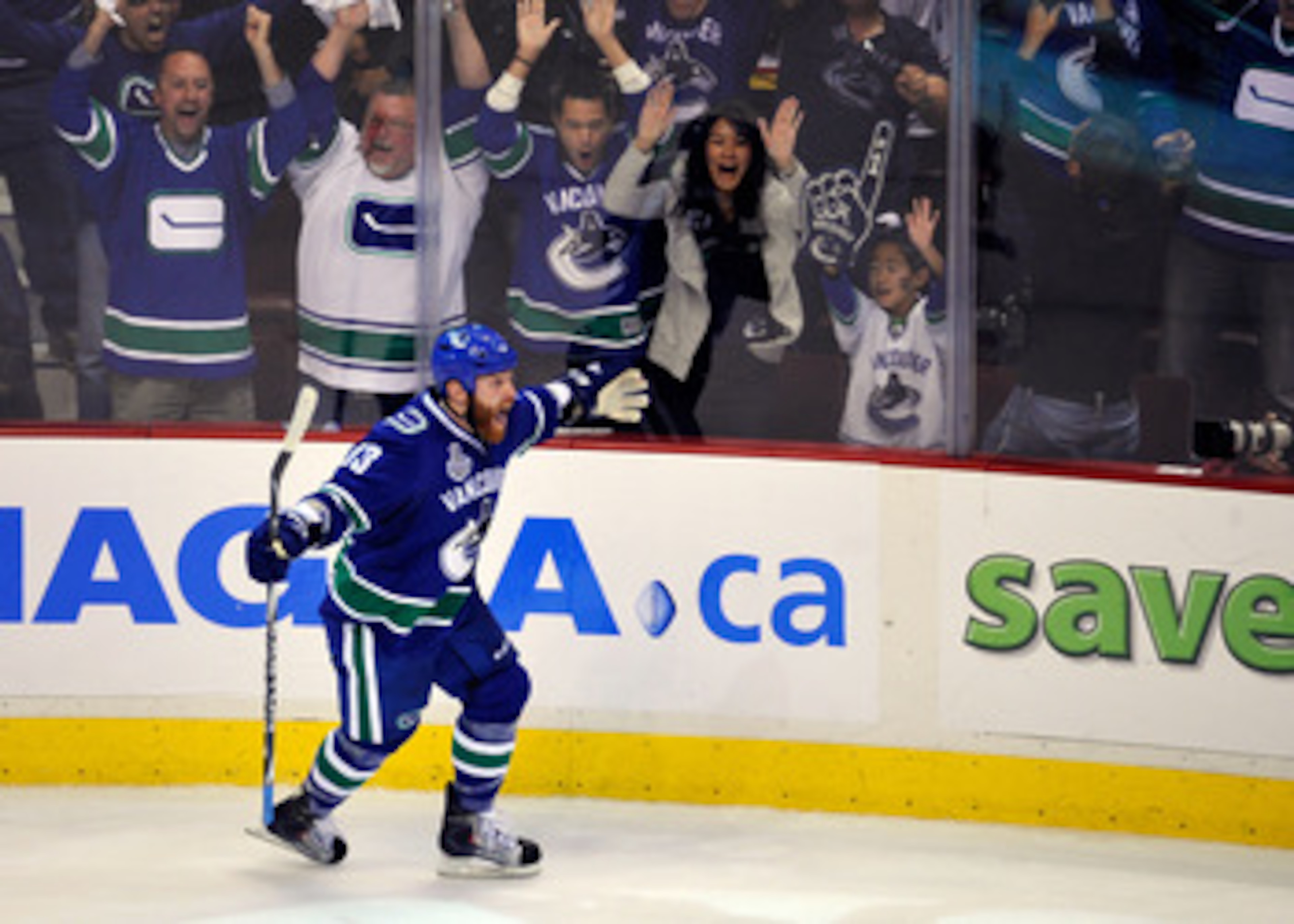 VANCOUVER, BC - JUNE 01:  Raffi Torres #13 of the Vancouver Canucks celebrates after scoring a goal late in the third period against Tim Thomas #30 of the Boston Bruins during game one of the 2011 NHL Stanley Cup Finals at Rogers Arena on June 1, 2011 in
