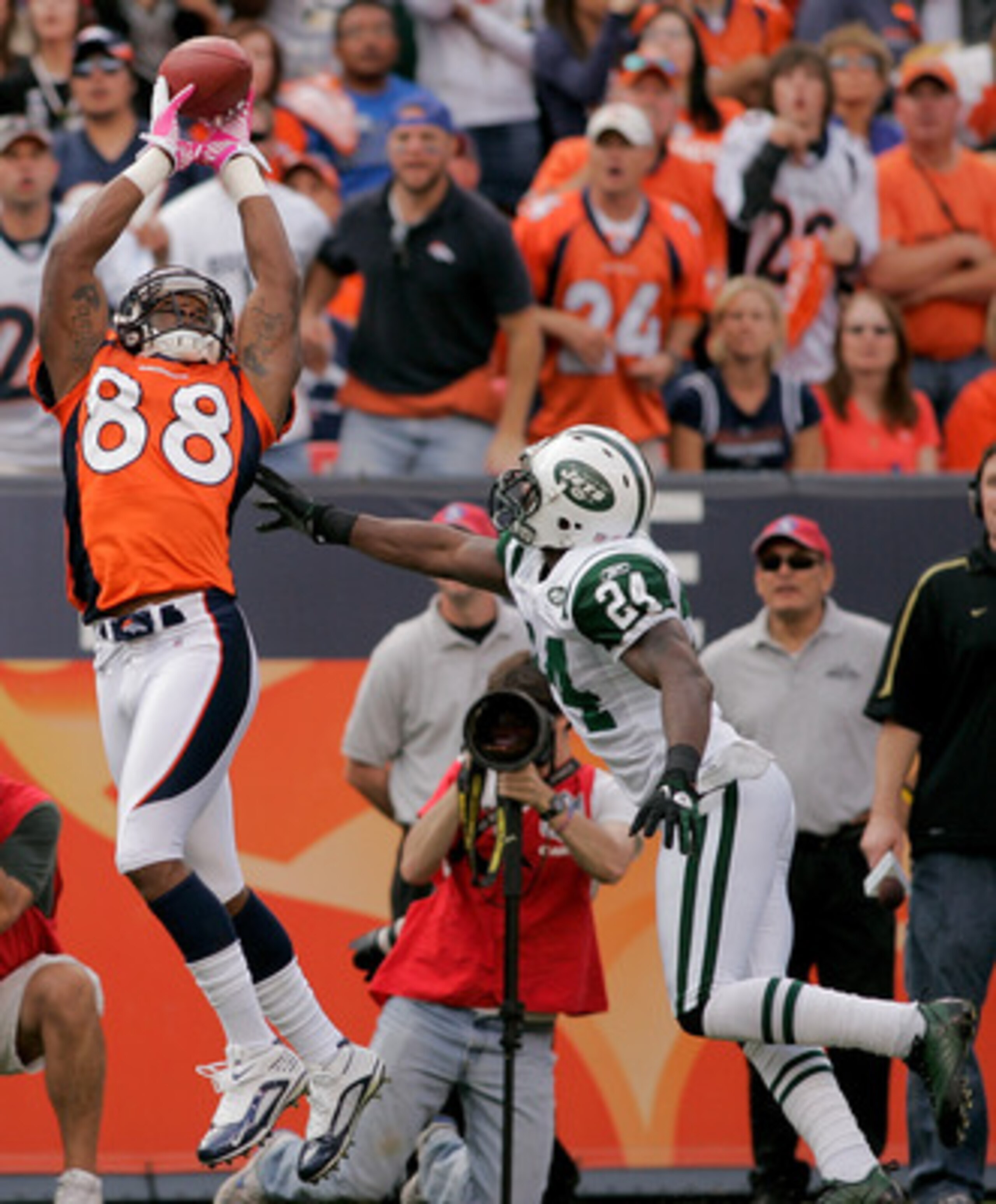 DENVER - OCTOBER 17: Wide receiver Demaryius Thomas #88 of the Denver Broncos makes a reception for a touchdown against cornerback Darrelle Revis #24 the New York Jets at INVESCO Field at Mile High on October 17, 2010 in Denver, Colorado. (Photo by Just DENVER - OCTOBER 17: Wide receiver Demaryius Thomas #88 of the Denver Broncos makes a reception for a touchdown against cornerback Darrelle Revis #24 the New York Jets at INVESCO Field at Mile High on October 17, 2010 in Denver, Colorado. (Photo by Just
