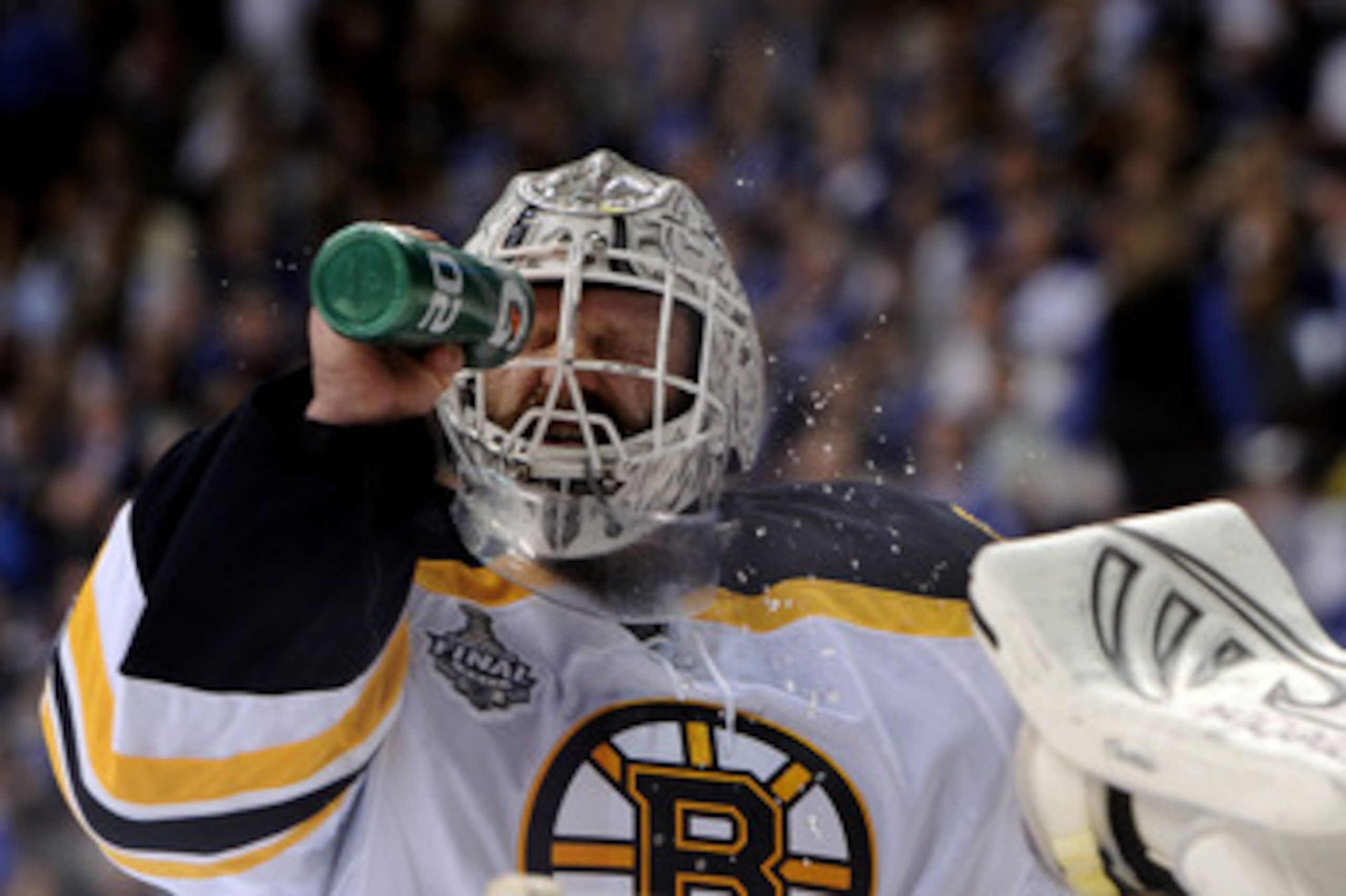 VANCOUVER, BC - JUNE 01:  Tim Thomas #30 of the Boston Bruins takes a drink during game one of the 2011 NHL Stanley Cup Finals at Rogers Arena on June 1, 2011 in Vancouver, Canada.  (Photo by Harry How/Getty Images)