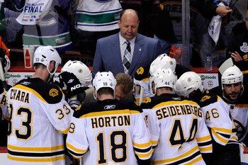 VANCOUVER, BC - JUNE 01:  Head Coach Claude Julien (C) of the Boston Bruins speaks to the player on the bench after a play against the Vancouver Canucks in game one of the 2011 NHL Stanley Cup Finals at Rogers Arena on June 1, 2011 in Vancouver, Canada.