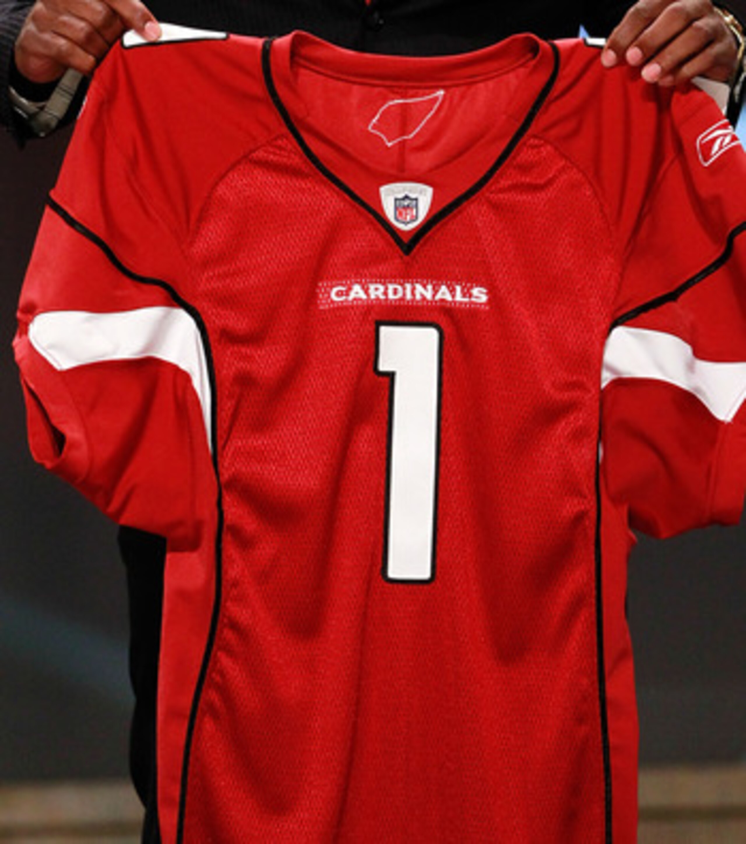NEW YORK, NY - APRIL 28:  Patrick Peterson, #5 overall pick by the Arizona Cardinals, holds up his jersey on stage during the 2011 NFL Draft at Radio City Music Hall on April 28, 2011 in New York City.  (Photo by Chris Trotman/Getty Images)