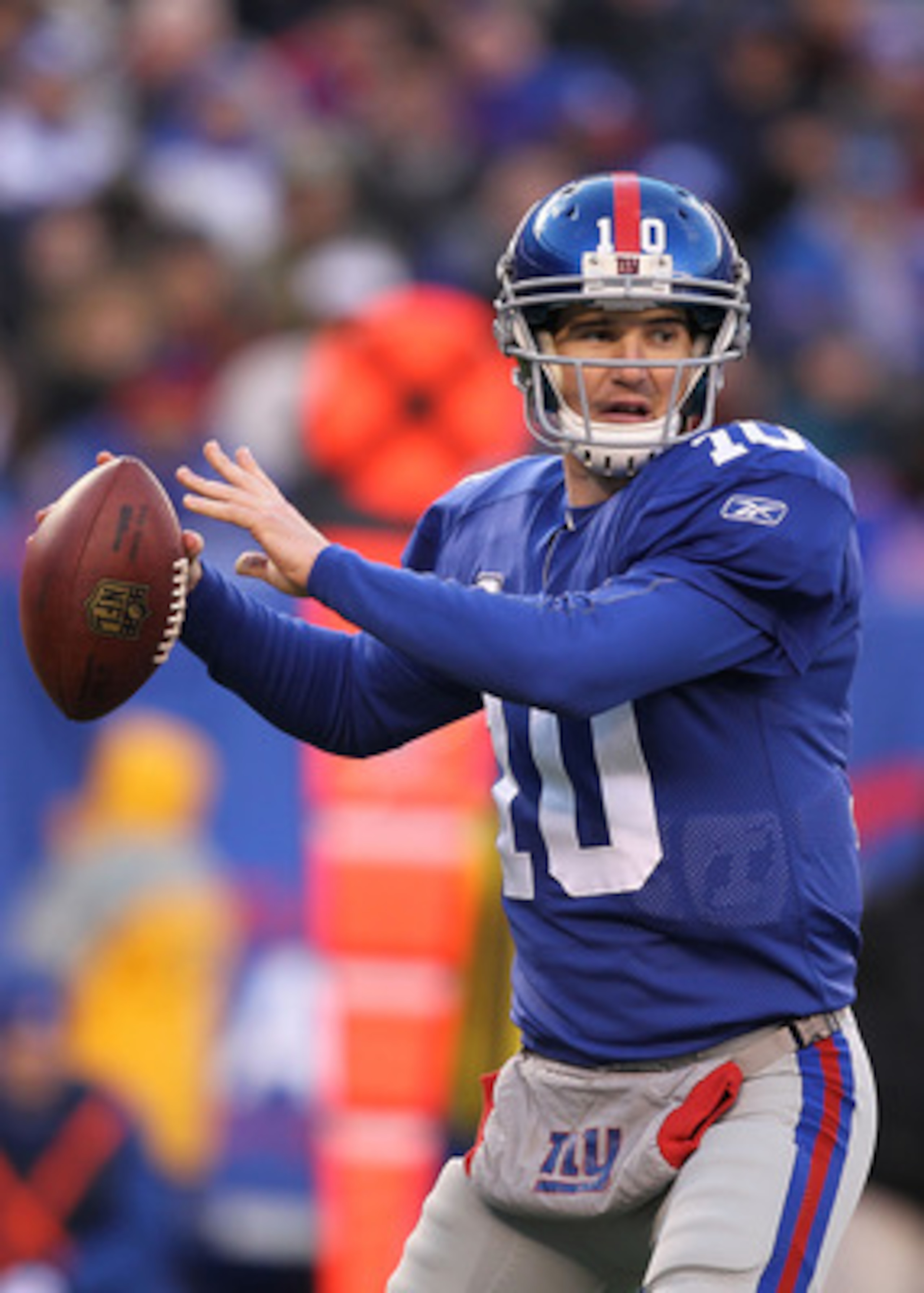 EAST RUTHERFORD, NJ - DECEMBER 05:  Eli Manning #10 of the New York Giants in action against the Washington Redskins during their game on December 5, 2010 at The New Meadowlands Stadium in East Rutherford, New Jersey.  (Photo by Al Bello/Getty Images)