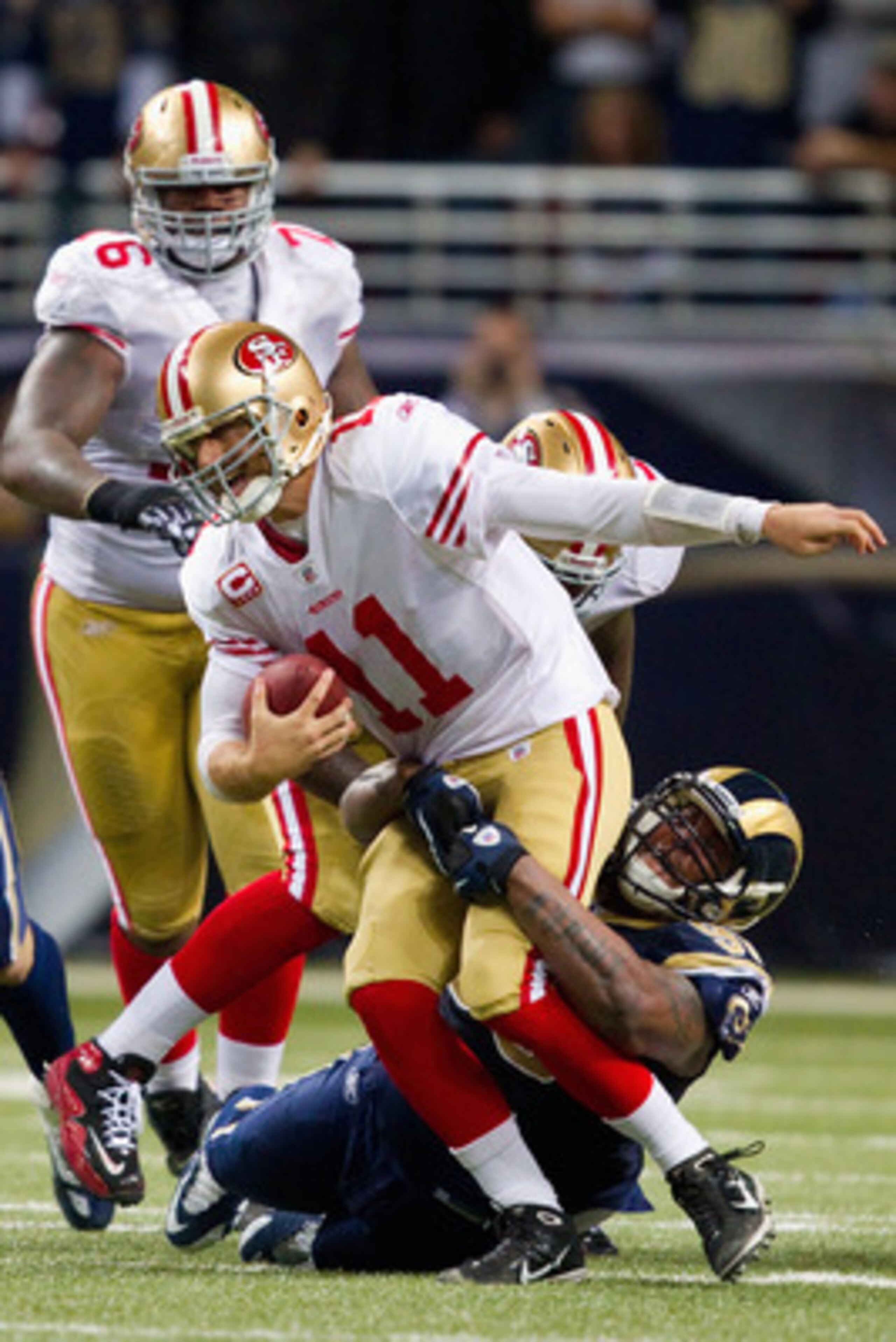 ST. LOUIS, MO - DECEMBER 26: Fred Robbins #98 of the St. Louis Rams sacks Alex Smith #11 of the San Francisco 49ers at the Edward Jones Dome on December 26, 2010 in St. Louis, Missouri. The Rams beat the 49ers 25-17. (Photo by Dilip Vishwanat/Getty Images