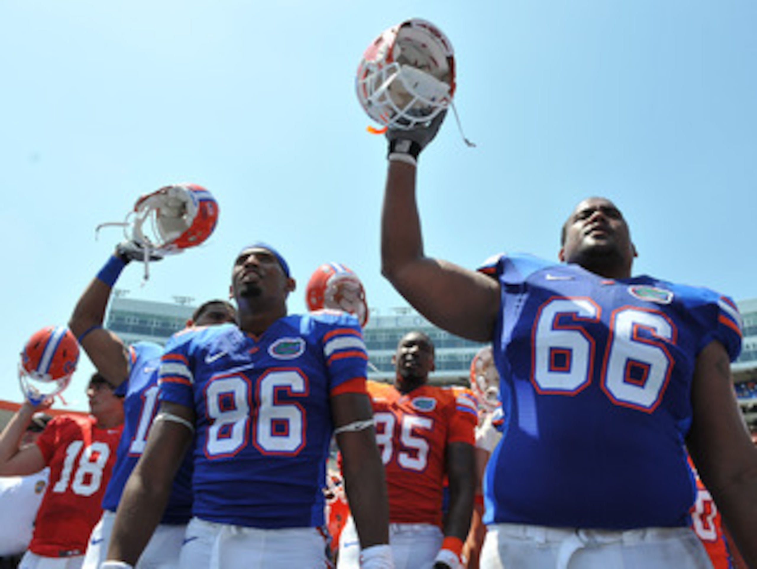GAINESVILLE, FL - APRIL 9:  Tight end Josh Postell #86 and guard James Wilson #66 of the Florida Gators celebrate after the Orange and Blue spring football game April 9, 2011 Ben Hill Griffin Stadium at Gainesville, Florida.  (Photo by Al Messerschmidt/Ge