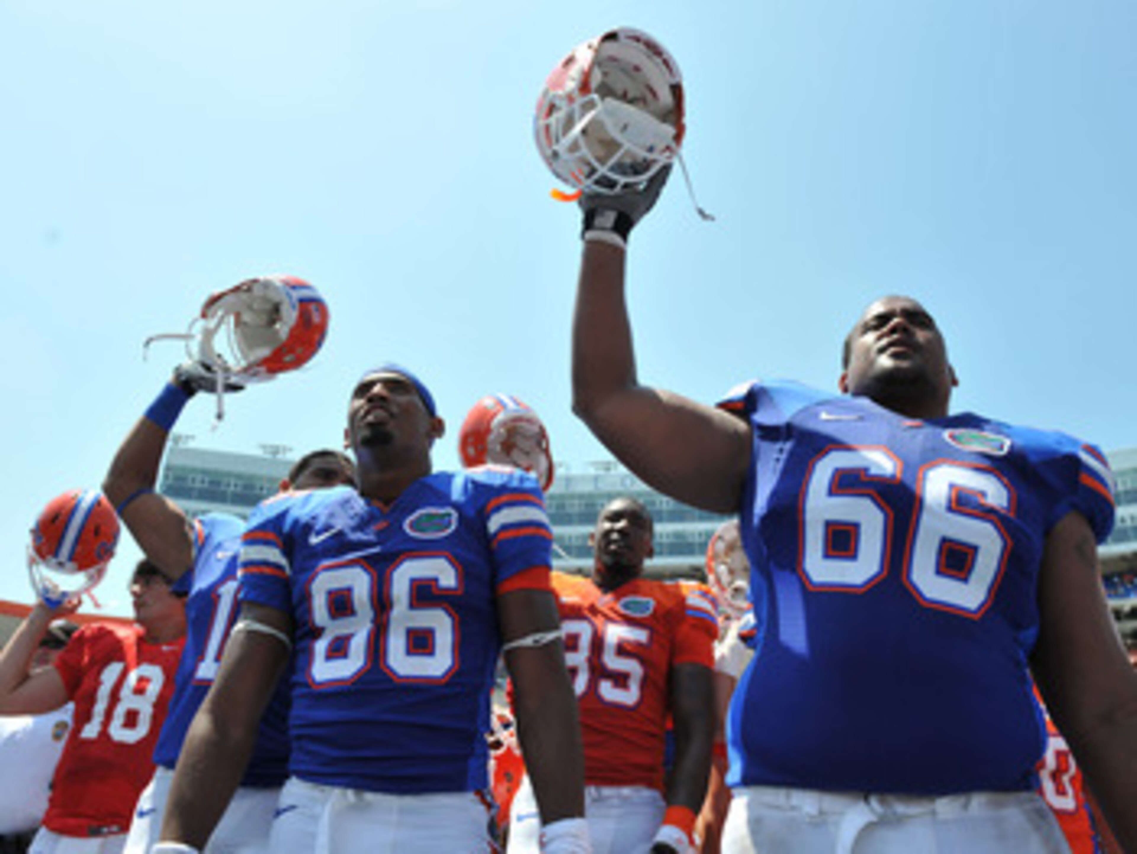 GAINESVILLE, FL - APRIL 9:  Tight end Josh Postell #86 and guard James Wilson #66 of the Florida Gators celebrate after the Orange and Blue spring football game April 9, 2011 Ben Hill Griffin Stadium at Gainesville, Florida.  (Photo by Al Messerschmidt/Ge