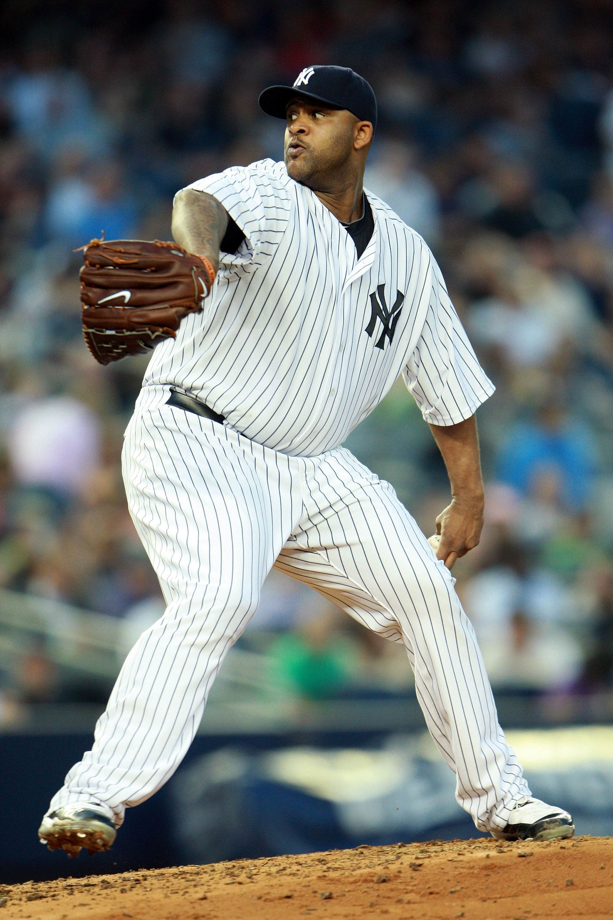 NEW YORK, NY - MAY 24:  CC Sabathia #52 of the New York Yankees pitches against the Toronto Blue Jays at Yankee Stadium on May 24, 2011 in the Bronx borough of New York City.  (Photo by Michael Heiman/Getty Images)
