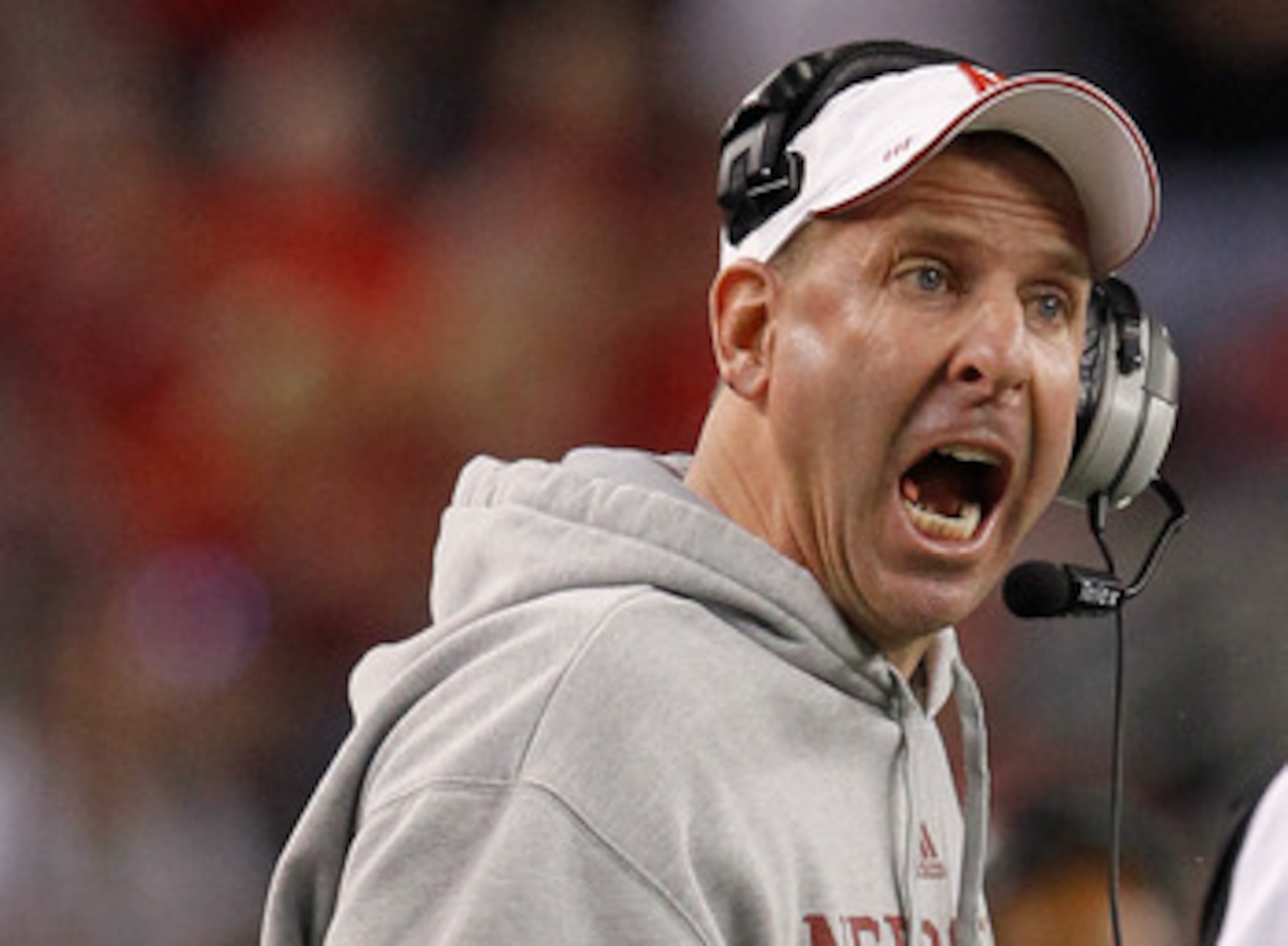 ARLINGTON, TX - DECEMBER 04:  Head coach Bo Pelini of the Nebraska Cornhuskers leads his team against the Oklahoma Sooners at Cowboys Stadium on December 4, 2010 in Arlington, Texas. The Sooners beat the Cornhuskers 23-20.  (Photo by Tom Pennington/Getty