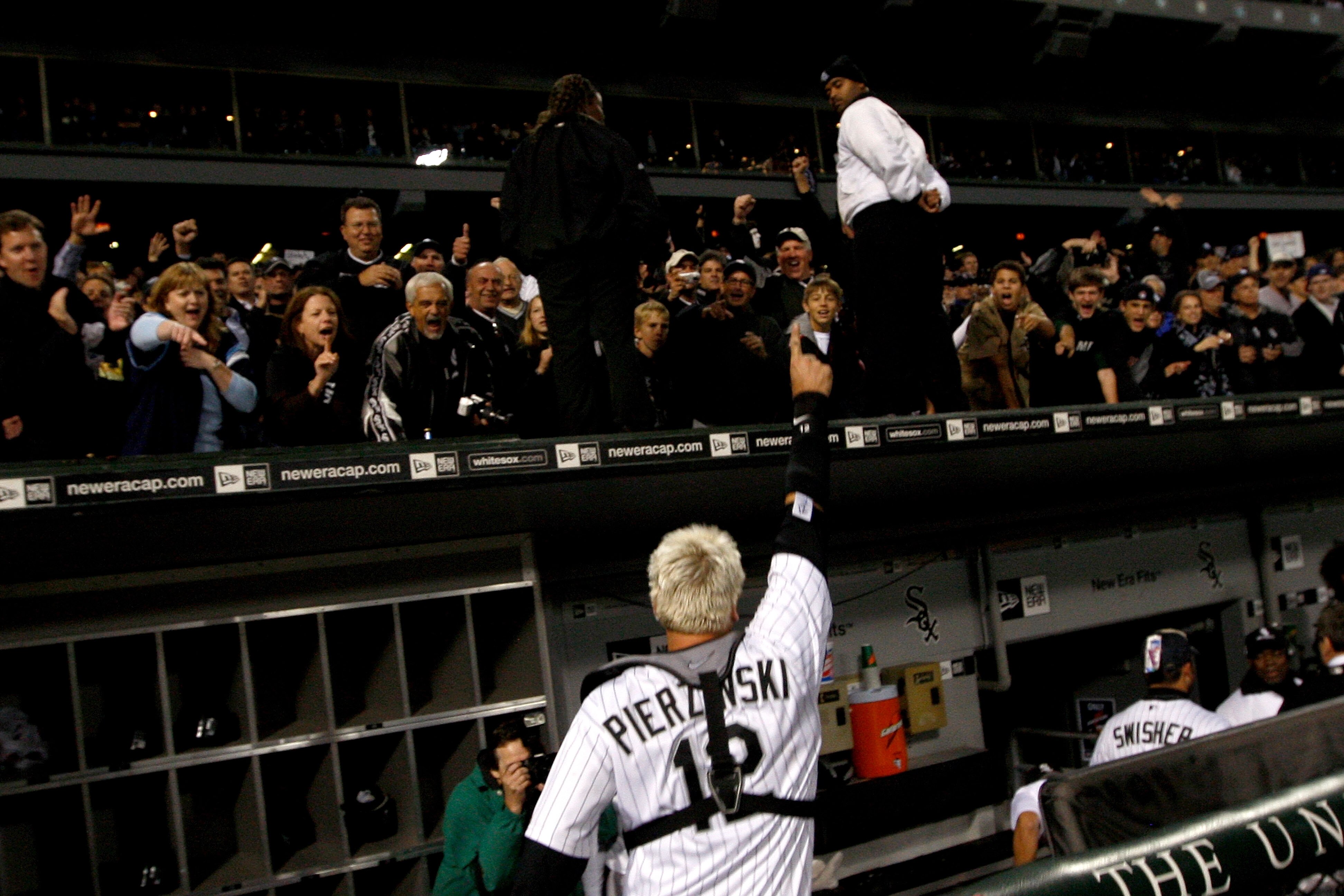 CHICAGO - SEPTEMBER 30:  Catcher A.J. Pierzynski #12 of the Chicago White Sox acknowledges the fans as he celebrates their 1-0 win against the Minnesota Twins during the American League Central Division Tiebreaker game at U.S. Cellular Field on September