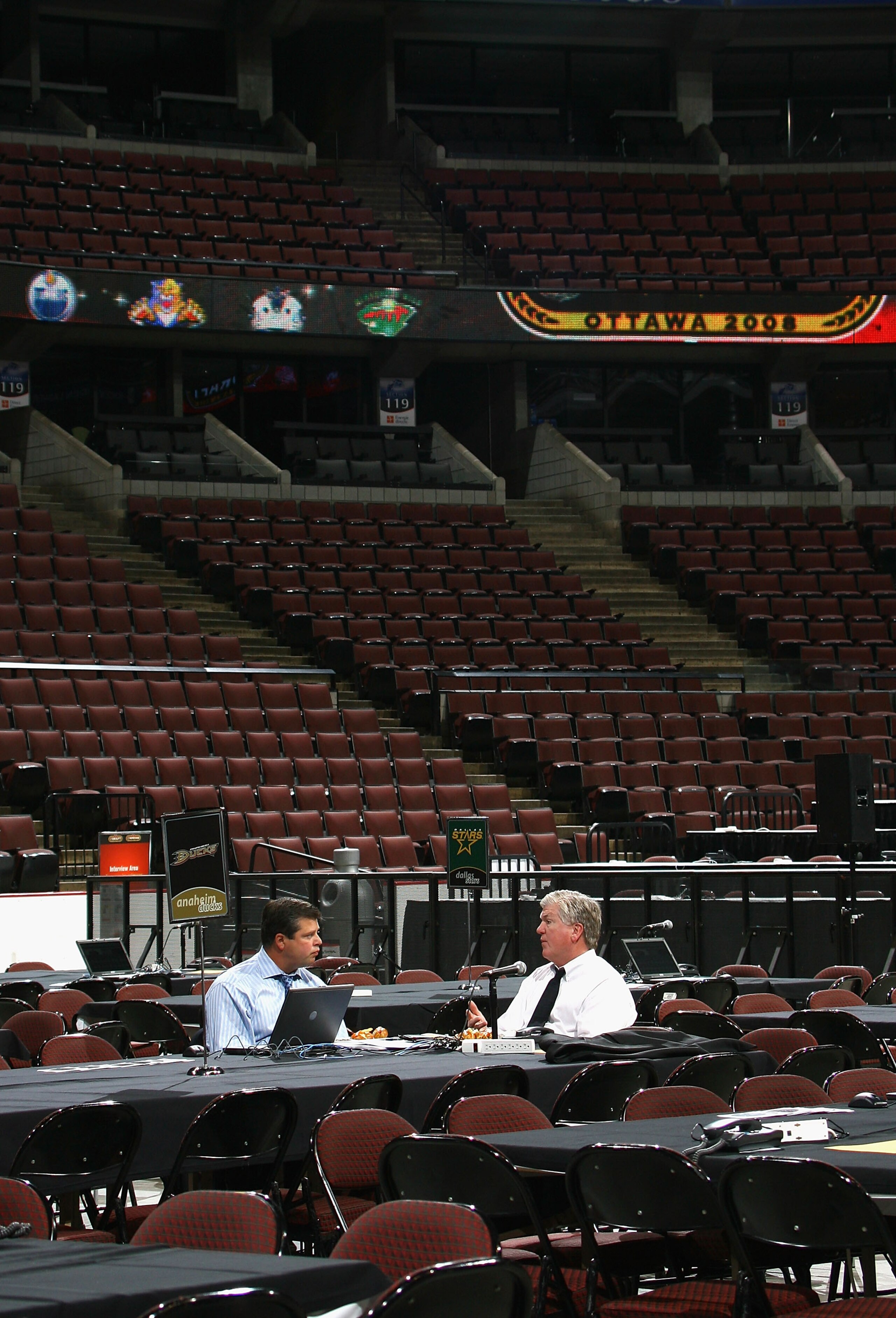 OTTAWA, ON - JUNE 20:  Anaheim Ducks general manager Brian Burke (R) talks with Dave Nonis before the 2008 NHL Entry Draft at Scotiabank Place on June 20, 2008 in Ottawa, Ontario, Canada.  (Photo by Bruce Bennett/Getty Images)