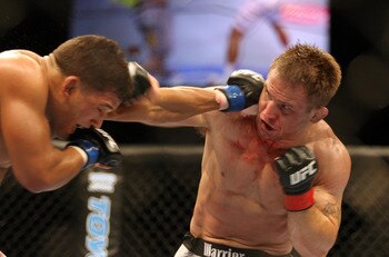 CHICAGO- OCTOBER 25:  Tyson Griffin (L) punches Sean Sherk in a Lightweight bout at UFC's Ultimate Fight Night at Allstate Arena on October 25, 2008 in Chicago, Illinois. (Photo by Tasos Katopodis/Getty Images)