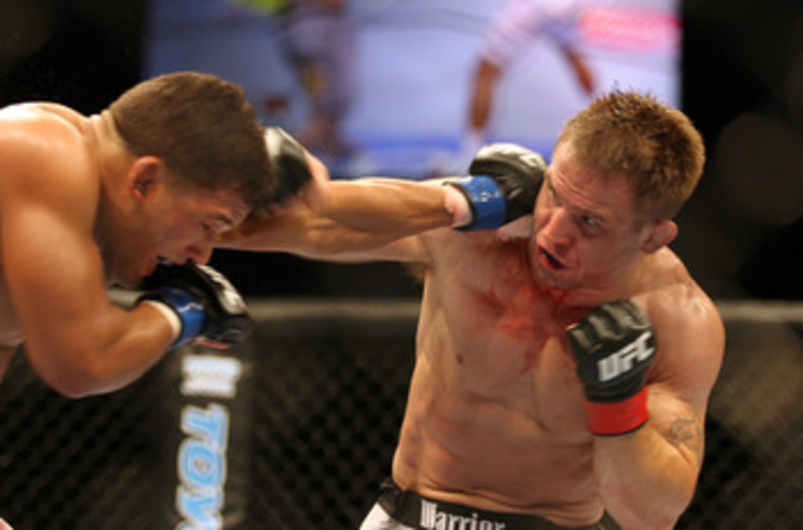 CHICAGO- OCTOBER 25:  Tyson Griffin (L) punches Sean Sherk in a Lightweight bout at UFC's Ultimate Fight Night at Allstate Arena on October 25, 2008 in Chicago, Illinois. (Photo by Tasos Katopodis/Getty Images)