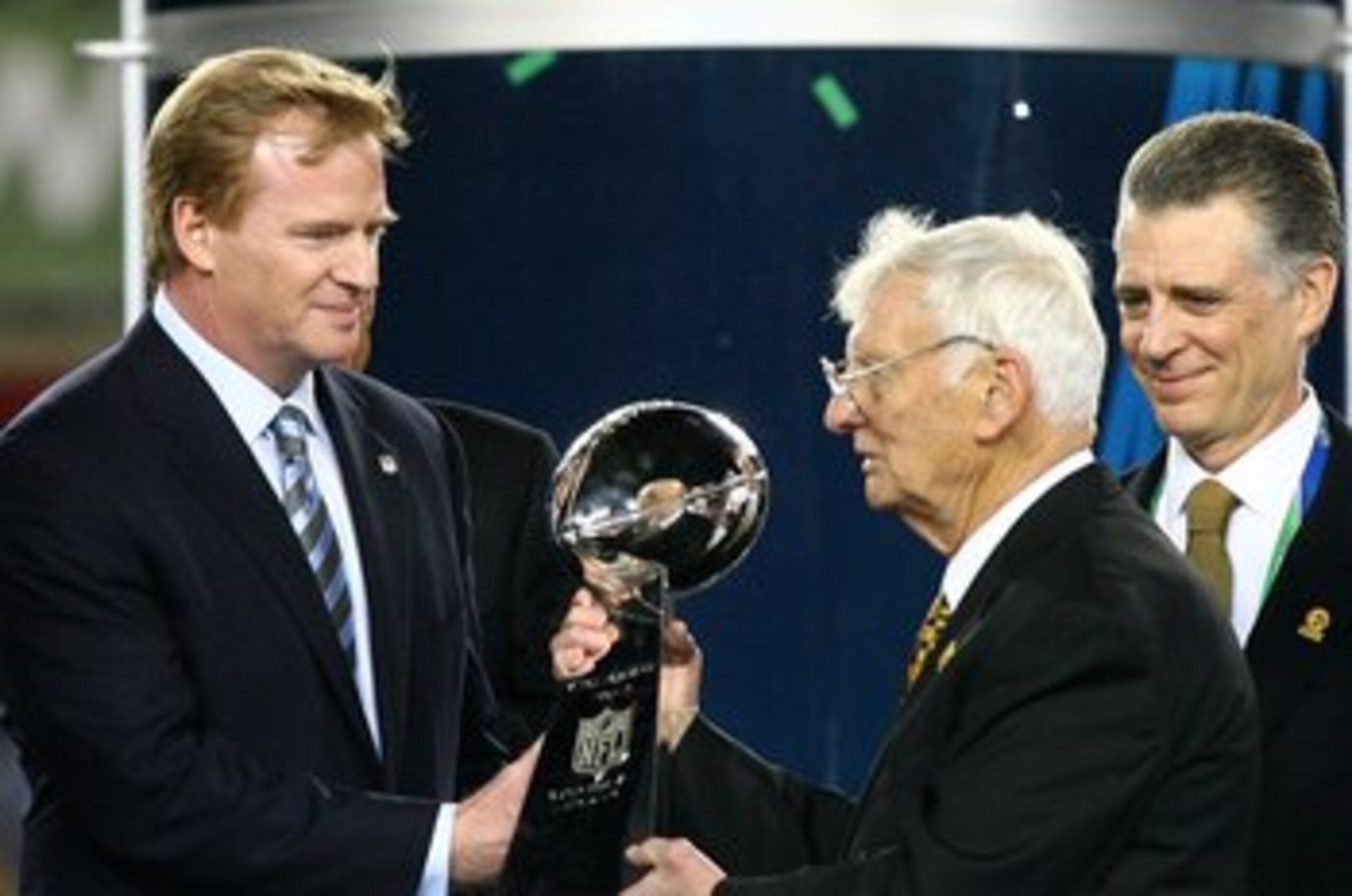 TAMPA, FL - FEBRUARY 01:  NFL Commissioner Roger Goodell (L) present Dan Rooney, team owner of the Pittsburgh Steelers, with the Vince Lombardi trophy after the Steelers won 27-23 against the Arizona Cardinals during Super Bowl XLIII on February 1, 2009 a