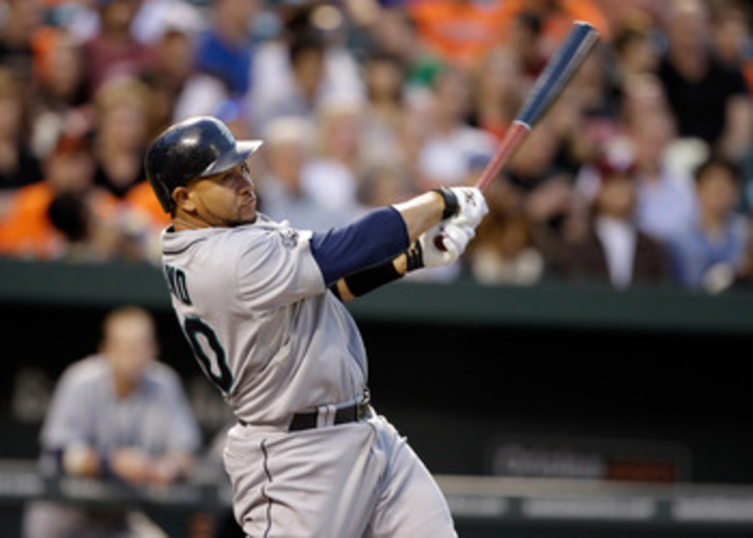 BALTIMORE, MD - MAY 12:  Miguel Olivo #30 of the Seattle Mariners at the plate against the Baltimore Orioles at Oriole Park at Camden Yards on May 12, 2011 in Baltimore, Maryland.  (Photo by Rob Carr/Getty Images)