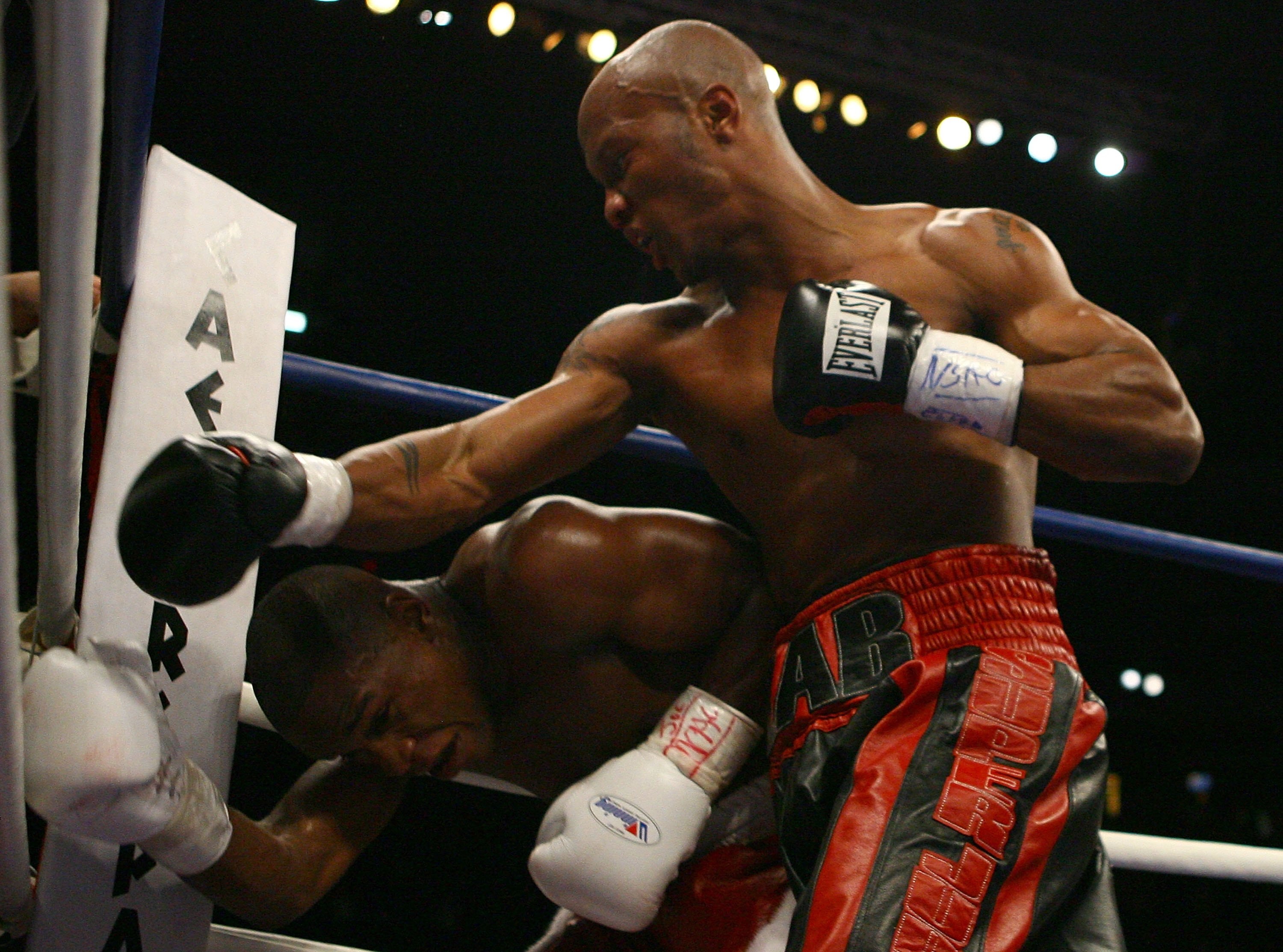 LAS VEGAS - APRIL 08:  (R-L) Zab Judah throws a right as Floyd Mayweather ducks under during the Welterweight Championship fight at Thomas & Mack Arena on April 8, 2006 in Las Vegas, Nevada.  (Photo by Al Bello/Getty Images)