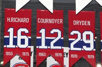MONTREAL- APRIL 19:  A photo of the banners commemorating the retired jerseys of Henri Richard, Yvan Cournoyer and Ken Dryden hanging in the Bell Centre prior to Game Three of the Eastern Conference Quarterfinals between the Washington Capitals and Montre