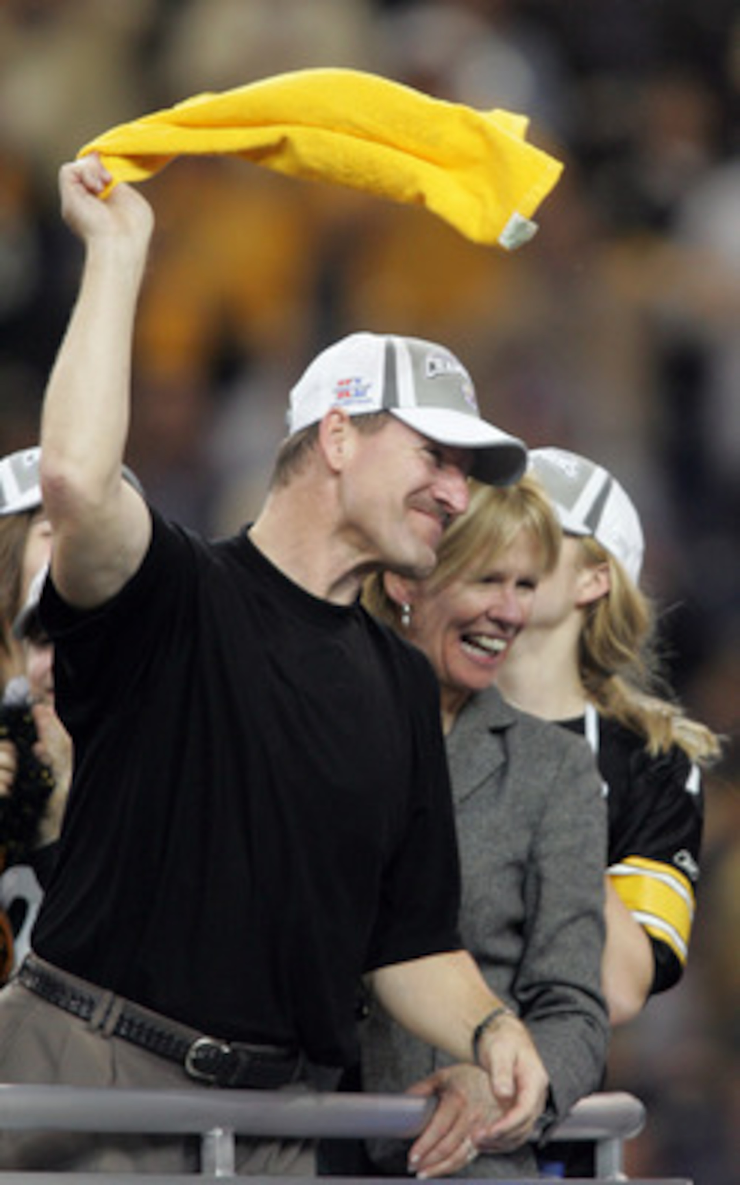 DETROIT - FEBRUARY 05: Head coach Bill Cowher of the Pittsburgh Steelers celebrates by waving a 'terrible towel' after defeating the Seattle Seahawks in Super Bowl XL at Ford Field on February 5, 2006 in Detroit, Michigan.The Steelers defeated the Seahawk