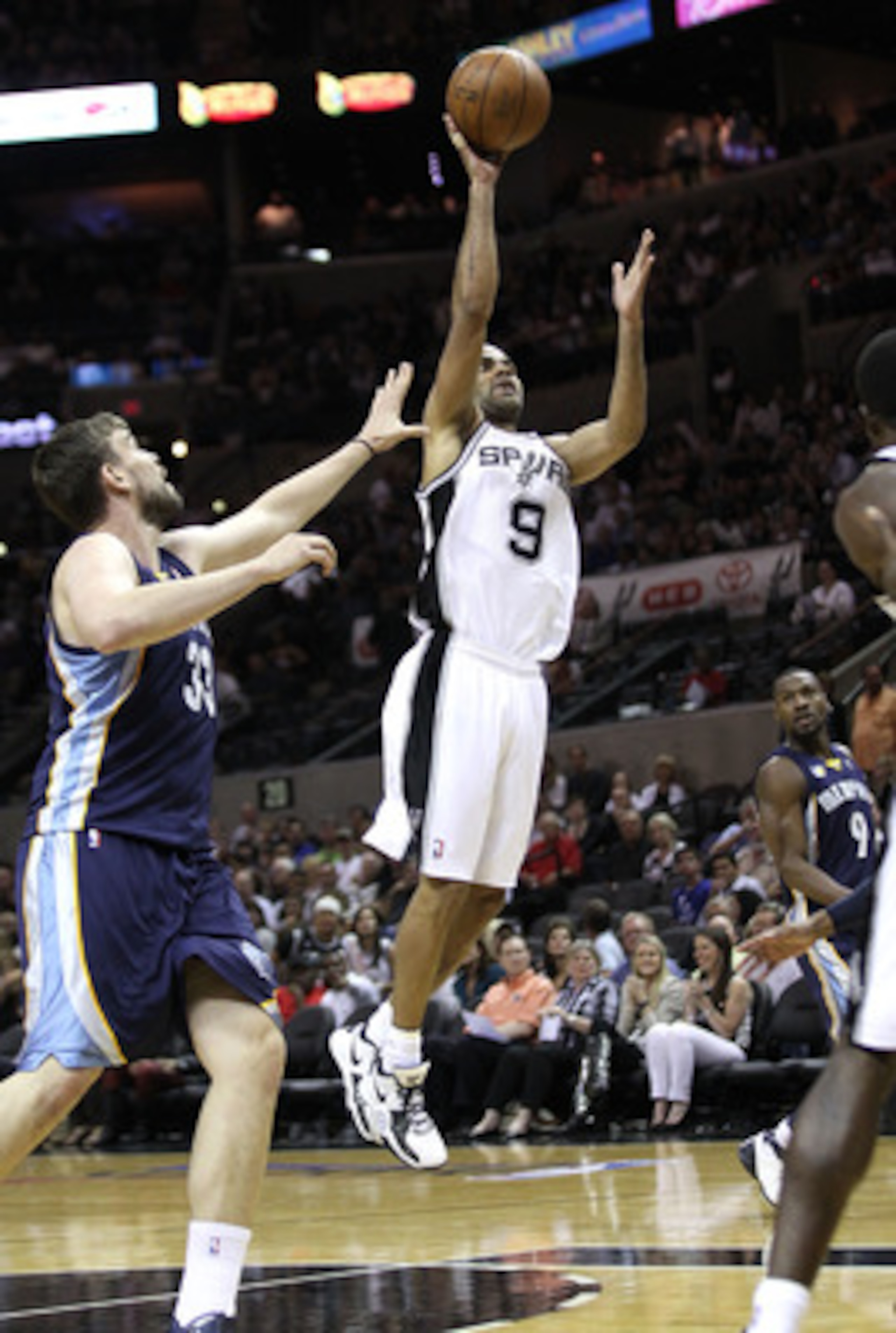 SAN ANTONIO, TX - APRIL 27:  Tony Parker #9 of the San Antionio Spurs shoots over Marc Gasol #33 of the Memphis Grizzlies in Game Five of the Western Conference Quarterfinals in the 2011 NBA Playoffs on April 27, 2011 at AT&T Center in San Antonio, Texas.