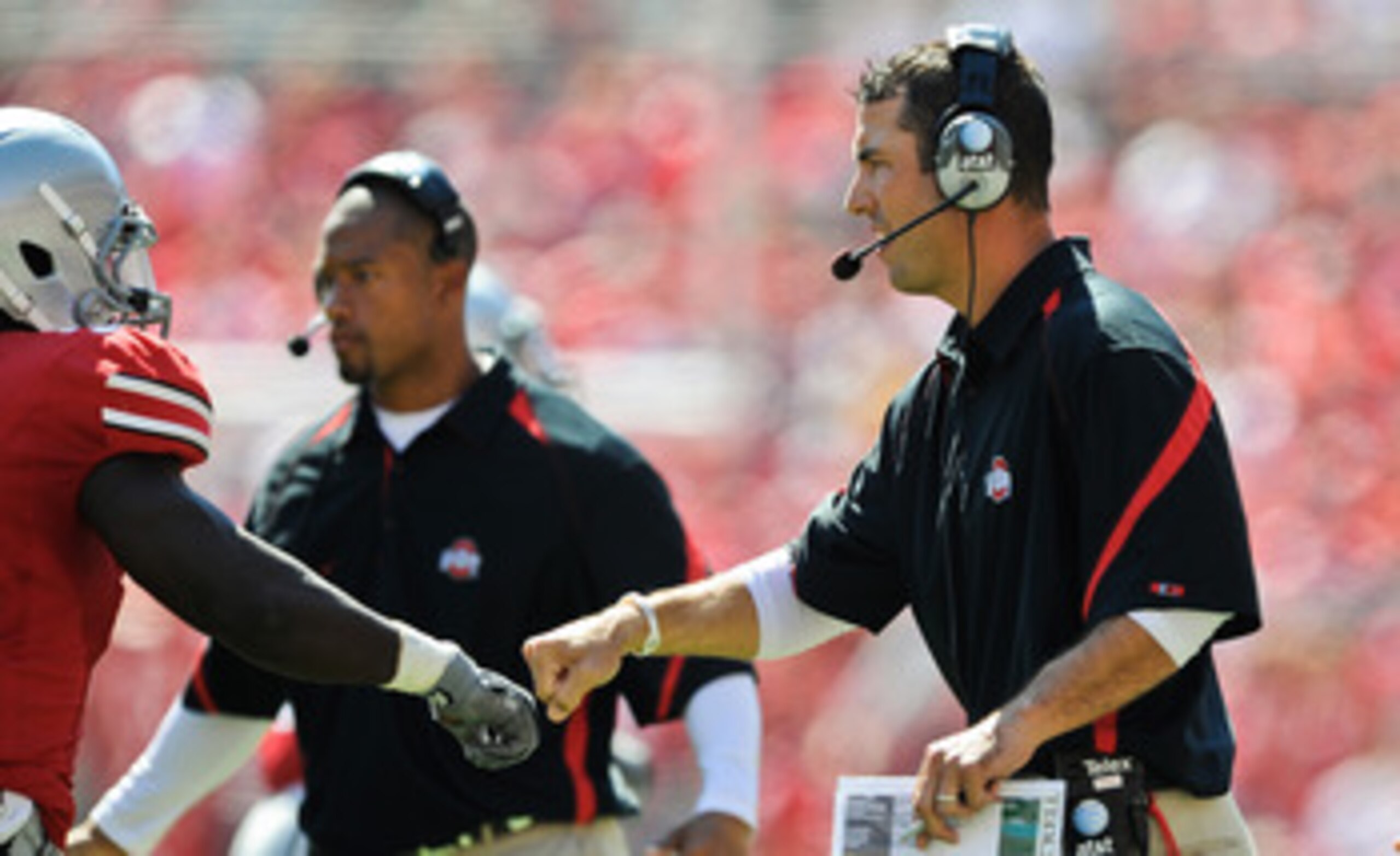 COLUMBUS, OH - SEPTEMBER 18:  Assistant Coach Luke Fickell of the Ohio State Buckeyes fists pump one of his players during a game against the Ohio Bobcats at Ohio Stadium on September 18, 2010 in Columbus, Ohio.  (Photo by Jamie Sabau/Getty Images)