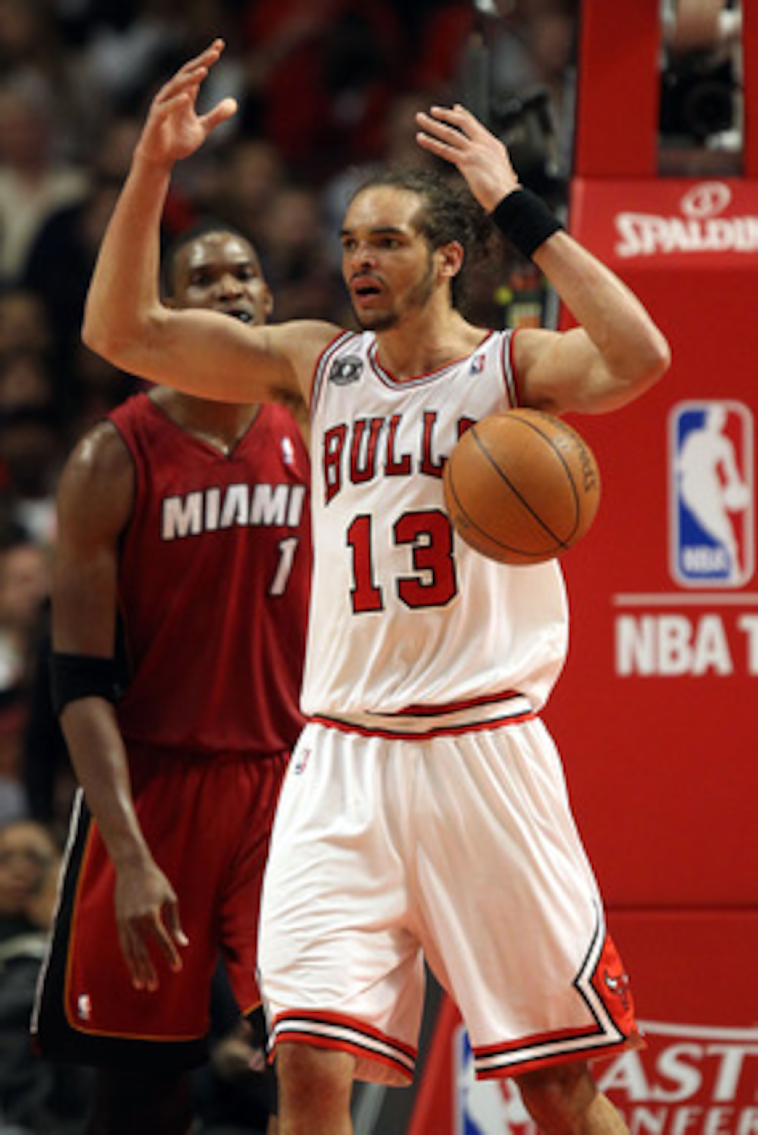 CHICAGO, IL - MAY 26:  Joakim Noah #13 of the Chicago Bulls reacts against the Miami Heat in Game Five of the Eastern Conference Finals during the 2011 NBA Playoffs on May 26, 2011 at the United Center in Chicago, Illinois. NOTE TO USER: User expressly ac