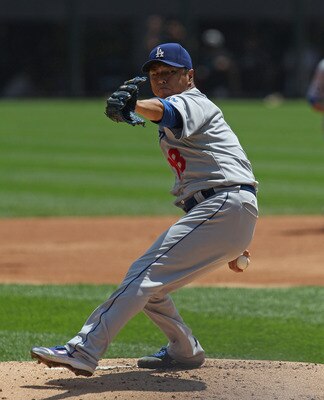 CHICAGO, IL - MAY 22:  Starting pitcher Hiroki Kuroda #18 of the Los Angeles Dodgers delivers the ball against the Chicago White Sox at U.S. Cellular Field on May 22, 2011 in Chicago, Illinois. The White Sox defeated the Dodgers 8-3.  (Photo by Jonathan D
