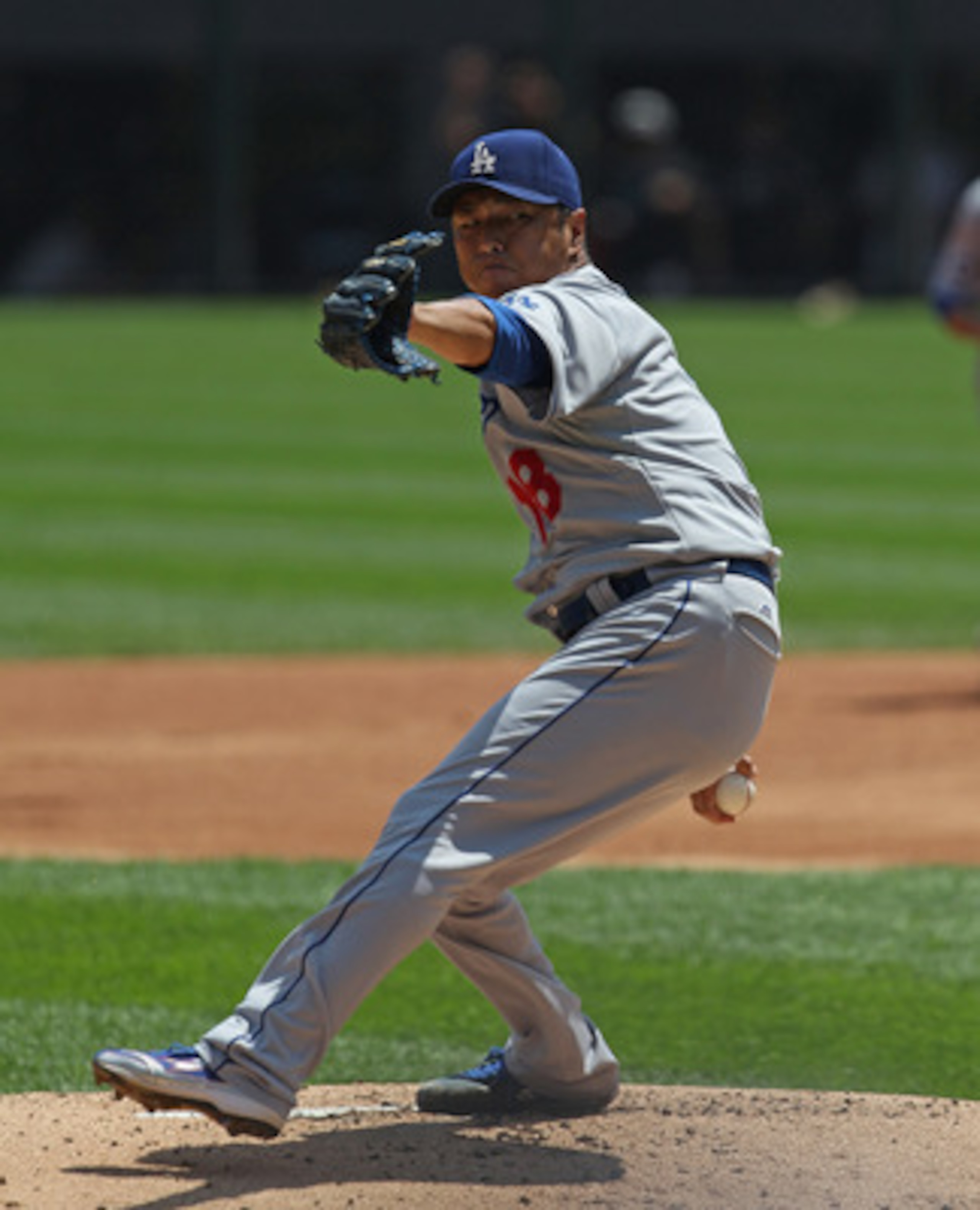 CHICAGO, IL - MAY 22:  Starting pitcher Hiroki Kuroda #18 of the Los Angeles Dodgers delivers the ball against the Chicago White Sox at U.S. Cellular Field on May 22, 2011 in Chicago, Illinois. The White Sox defeated the Dodgers 8-3.  (Photo by Jonathan D