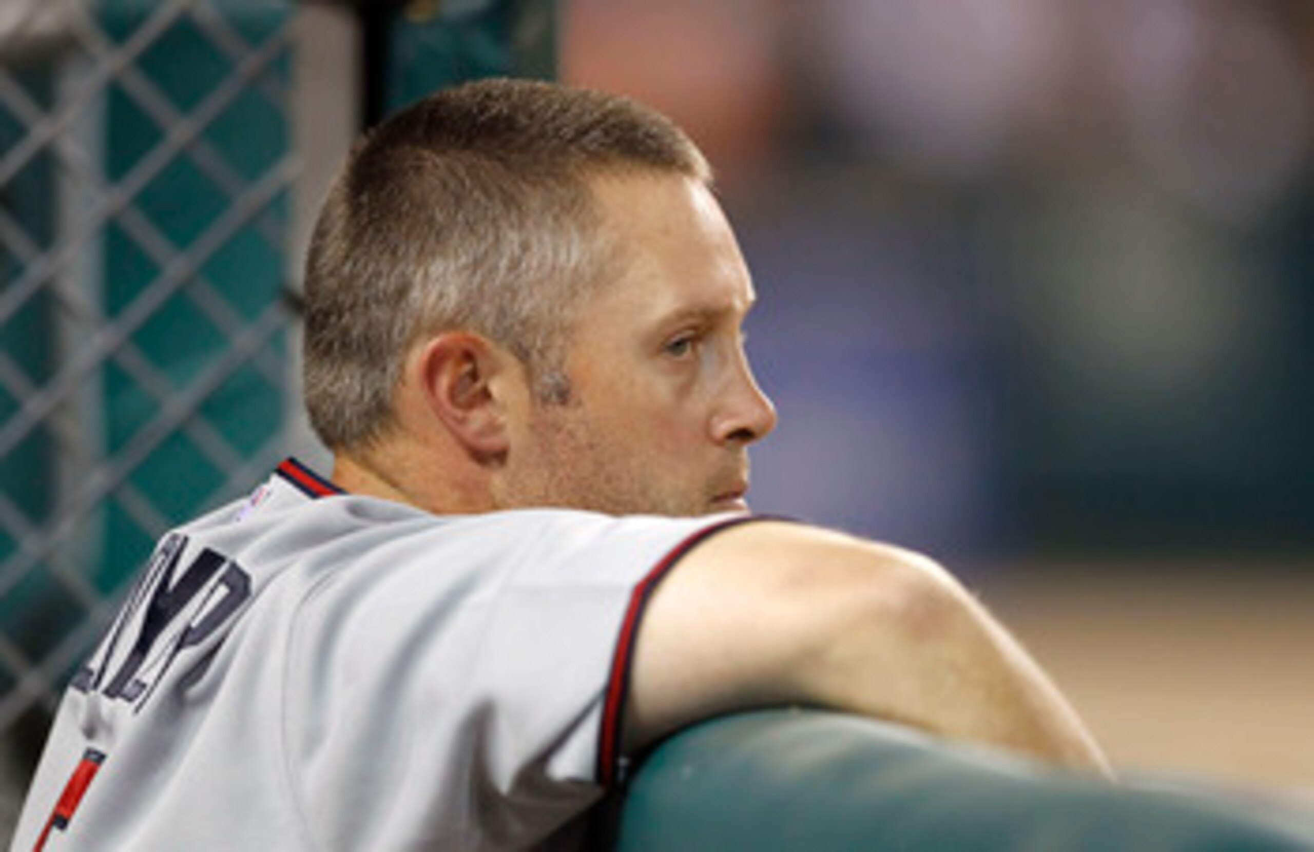 DETROIT - JUNE 01: Michael Cuddyer #5 of the Minnesota Twins watches the action during the ninth inning of the game against the Detroit Tigers at Comerica Park on June 1, 2011 in Detroit, Michigan. The Tigers defeated the Twins 4-2. (Photo by Leon Halip/G