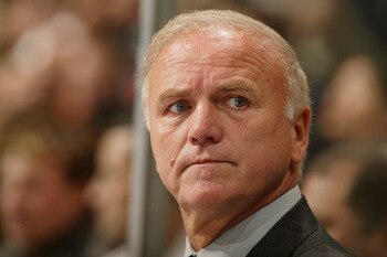 VANCOUVER - NOVEMBER 8:  Head coach Jacques Lemaire of the Minnesota Wild watches the action from the bench during the game against the Vancouver Canucks at General Motors Place on November 8, 2003 in Vancouver, Canada. Vancouver defeated Minnesota 4-3. (