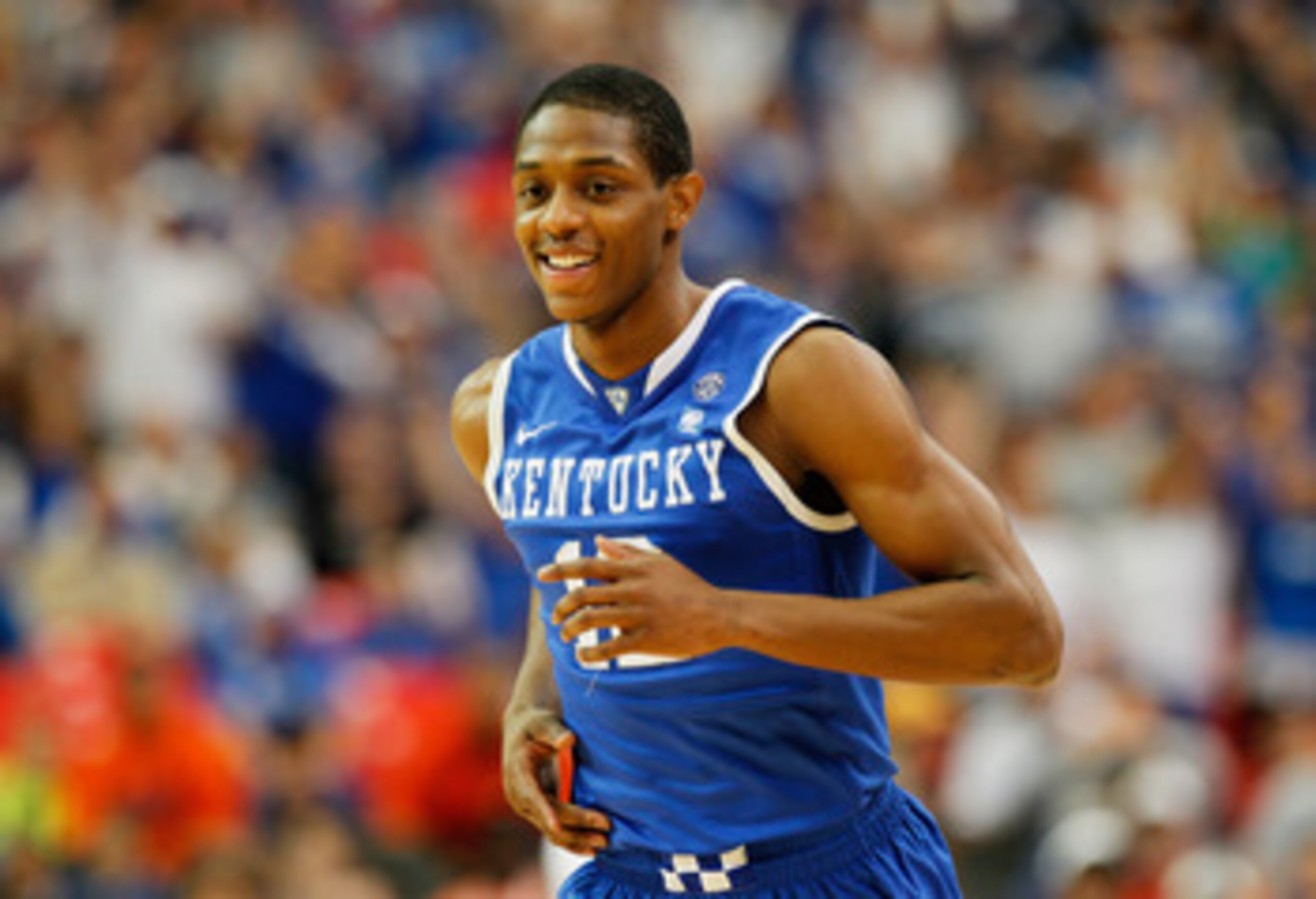 ATLANTA, GA - MARCH 13:  Brandon Knight #12 of the Kentucky Wildcats celebrates during their 70 to 54 win over the Florida Gators in the championship game of the SEC Men's Basketball Tournament at Georgia Dome on March 13, 2011 in Atlanta, Georgia.  (Phot