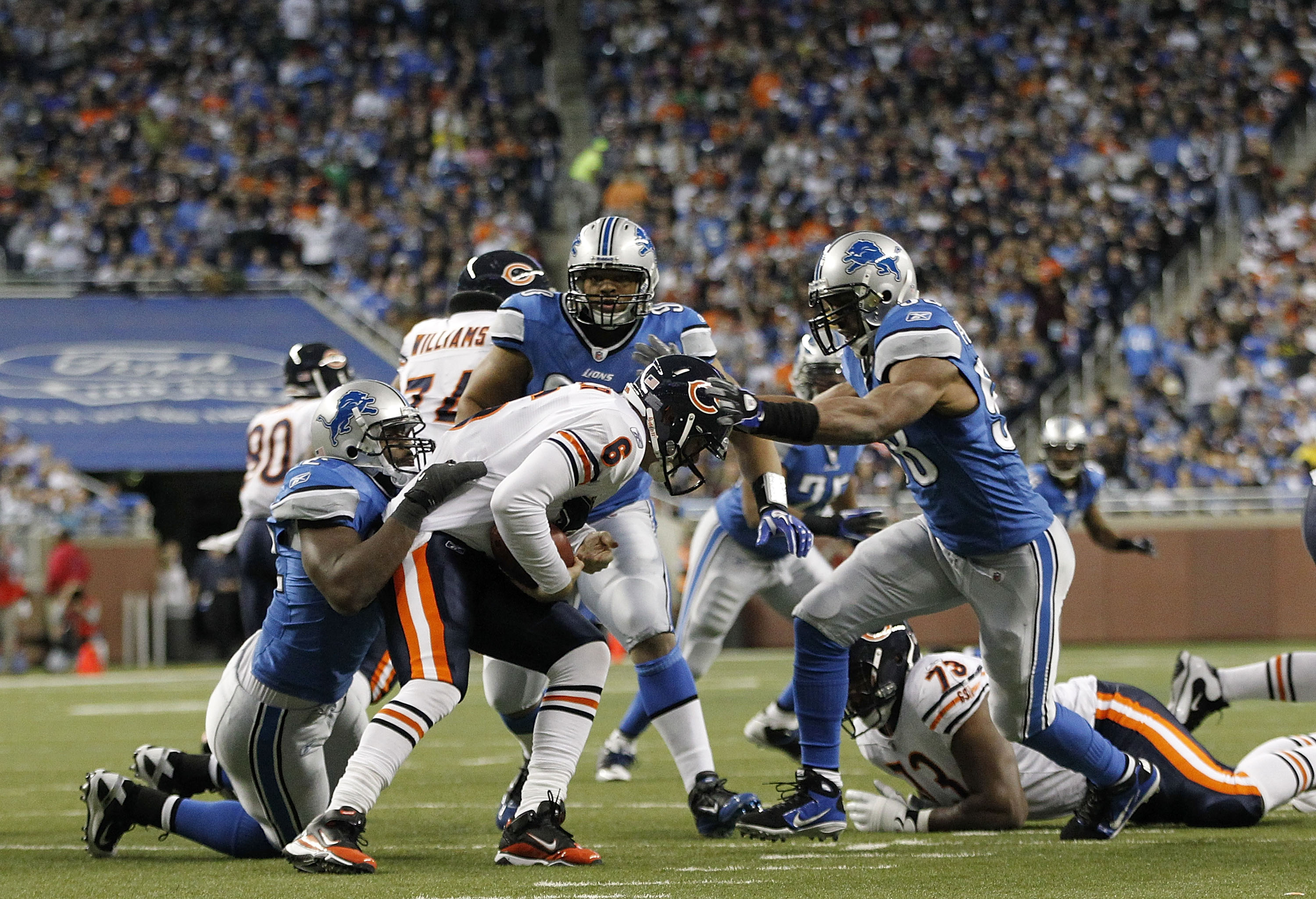 DETROIT - DECEMBER 05: Jay Cutler #6 of the Chicago Bears is sacked by Cliff Avril #92 and Julian Peterson #98 of the Detroit Lions as Ndamukong Suh #90 looks on during the game at Ford Field on December 5, 2010 in Detroit, Michigan. The Bears defeated th