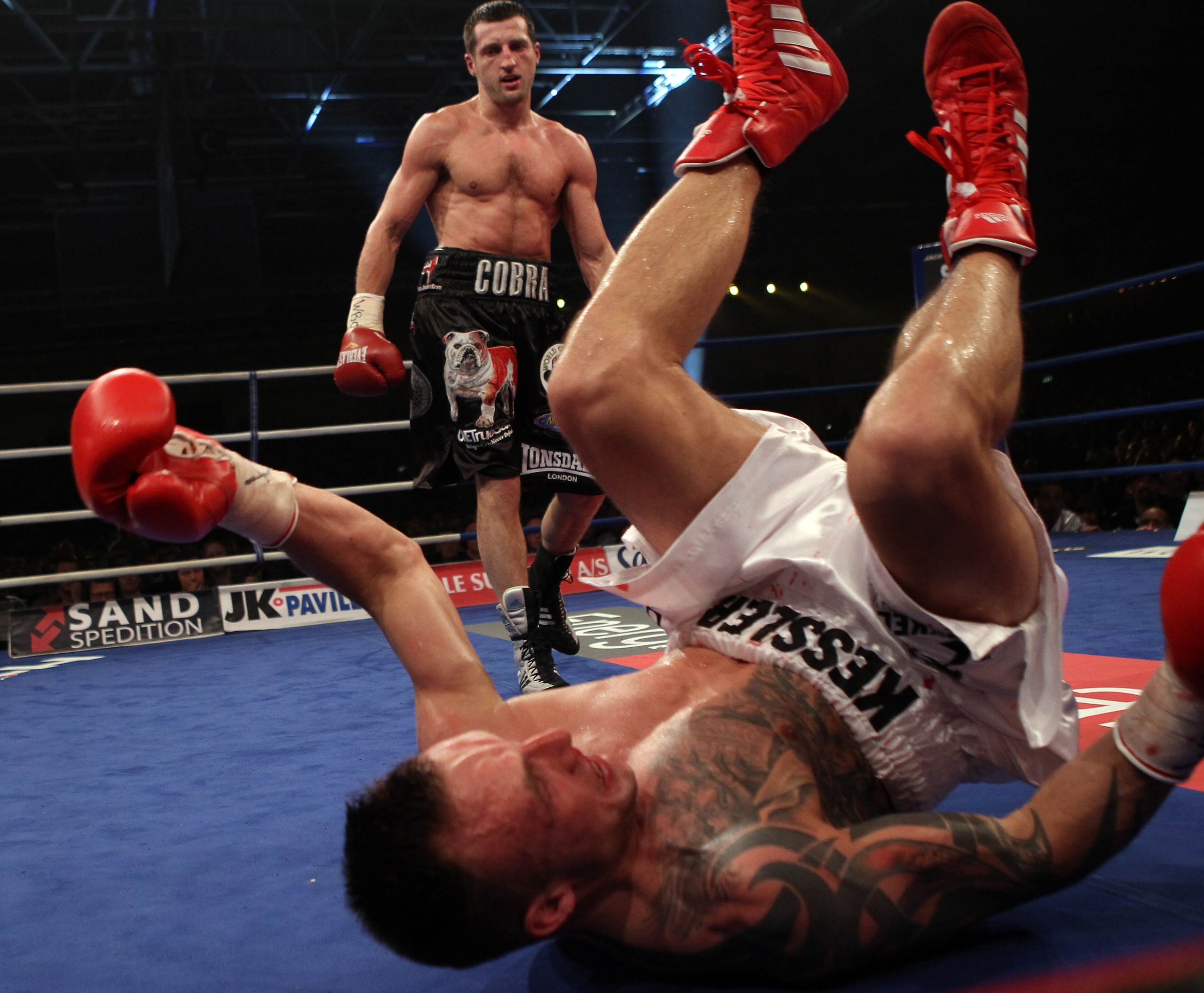 HERNING, DENMARK - APRIL 24: Carl Froch of England knocks down Mikkel Kessler of Denmark during their Super Six WBC Super Middleweight title fight on April 24, 2010 at MCH Messecenter Arena in Herning, Denmark. (Photo by John Gichigi/Getty Images) HERNING, DENMARK - APRIL 24: Carl Froch of England knocks down Mikkel Kessler of Denmark during their Super Six WBC Super Middleweight title fight on April 24, 2010 at MCH Messecenter Arena in Herning, Denmark. (Photo by John Gichigi/Getty Images)