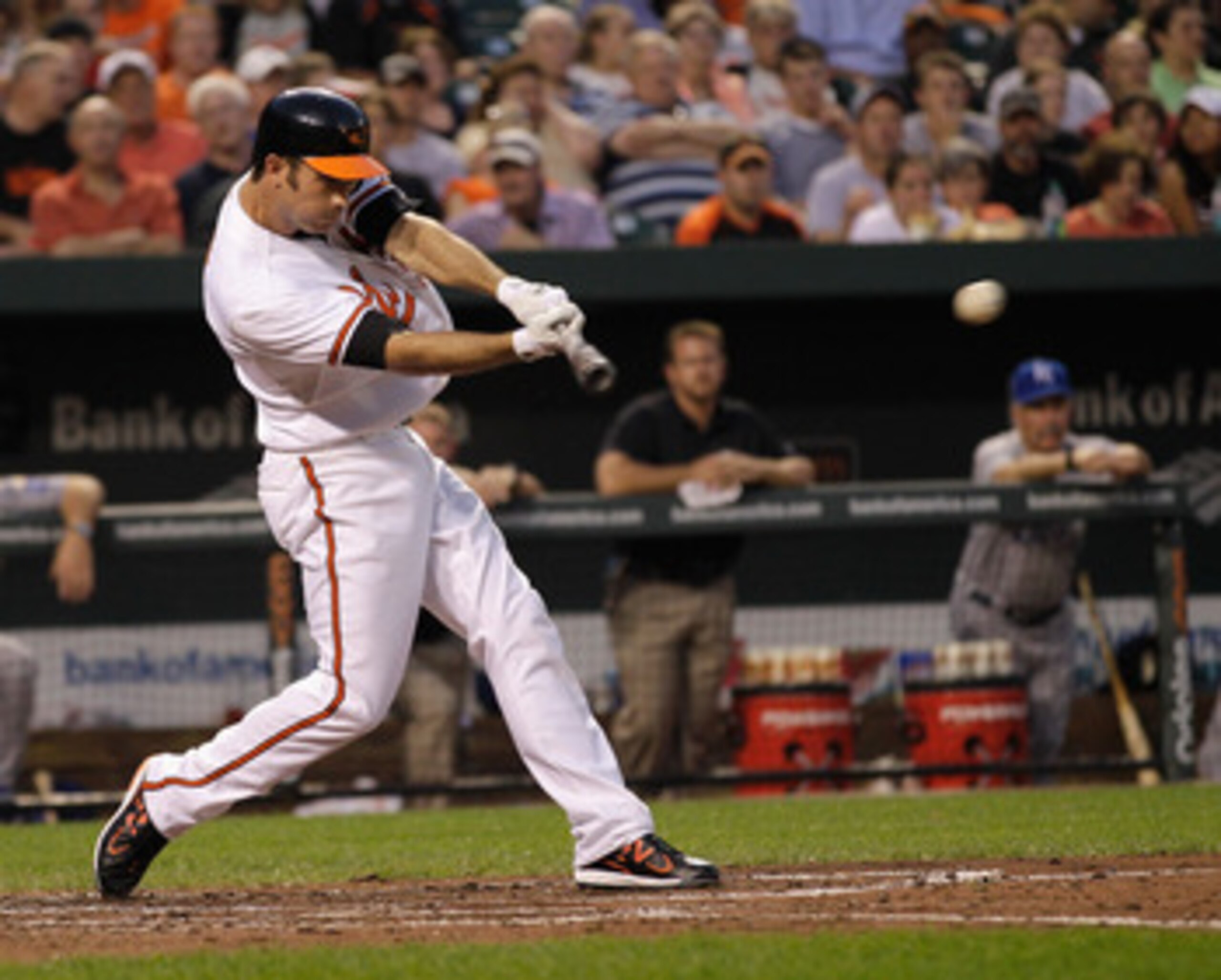 BALTIMORE, MD - MAY 25: J.J. Hardy #2 of the Baltimore Orioles connects for an RBI single against the Kansas City Royals during the fourth inning at Oriole Park at Camden Yards on May 25, 2011 in Baltimore, Maryland.  (Photo by Rob Carr/Getty Images)