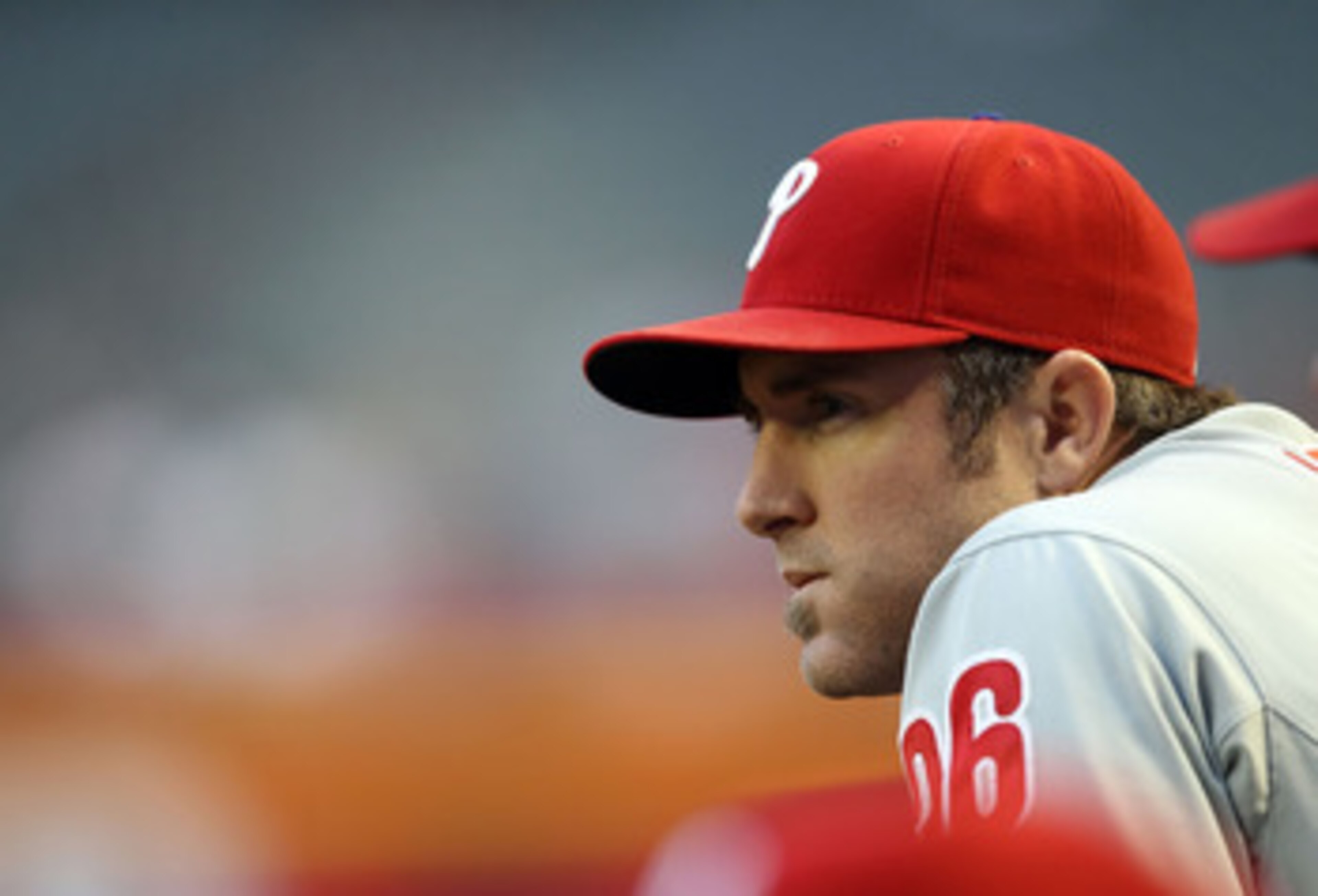 PHOENIX, AZ - APRIL 26:  Chase Utley #26 of the Philadelphia Phillies watches from the dugout during the Major League Baseball game against the Arizona Diamondbacks at Chase Field on April 26, 2011 in Phoenix, Arizona. The Diamondbacks defeated the Philli