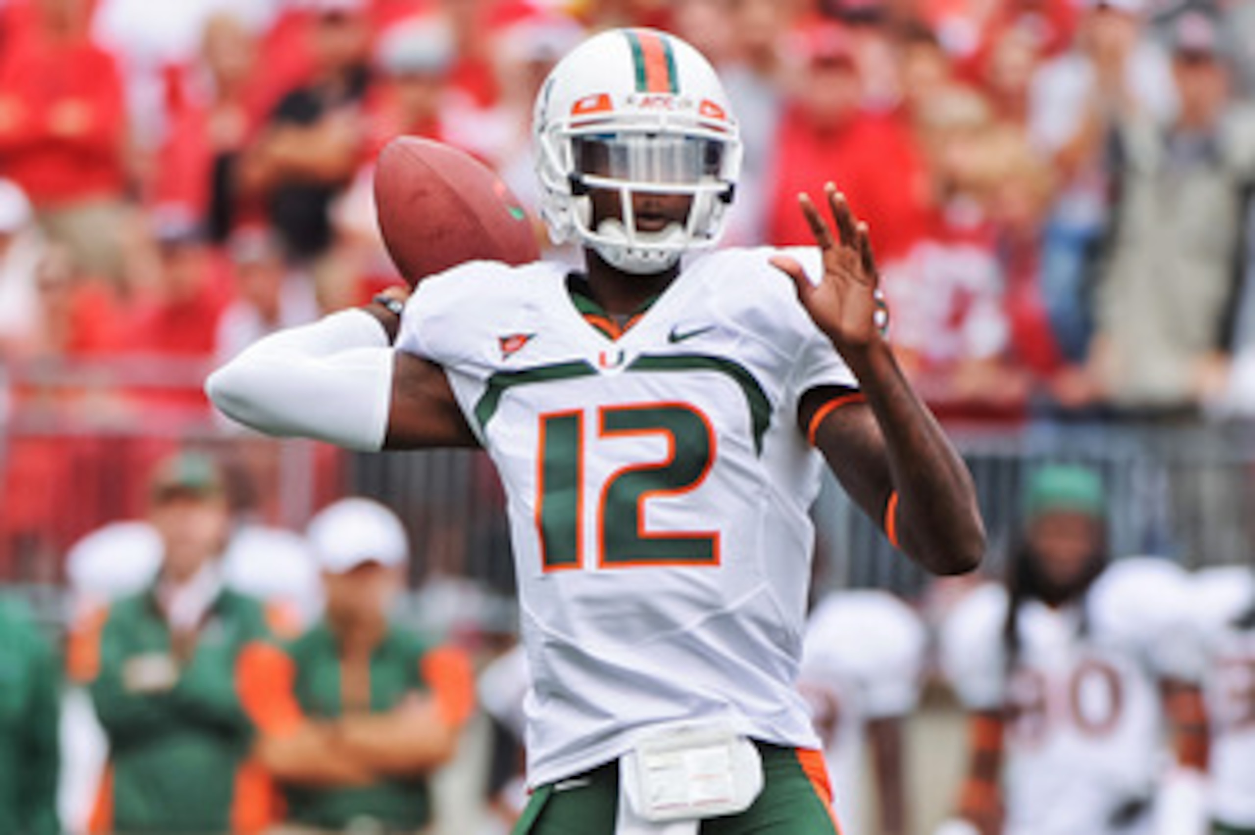 COLUMBUS, OH - SEPTEMBER 11:  Quarterback Jacory Harris #12 of the Miami Hurricanes passes the ball against the Ohio State Buckeyes at Ohio Stadium on September 11, 2010 in Columbus, Ohio.  (Photo by Jamie Sabau/Getty Images)