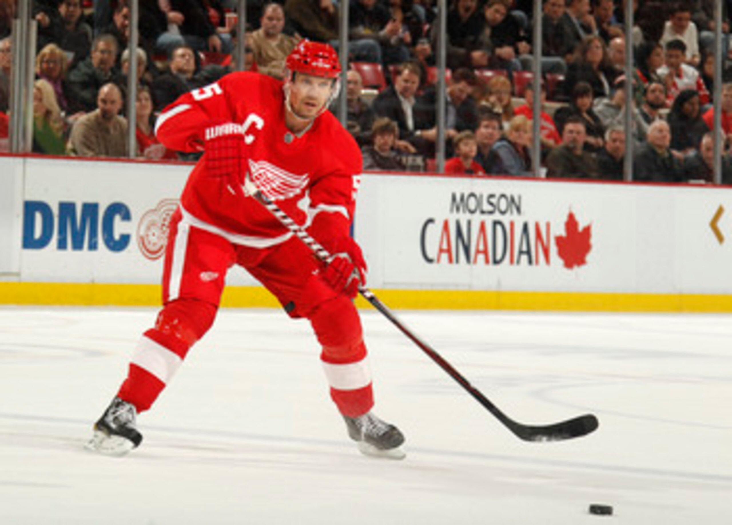 DETROIT, MI - FEBRUARY 24:  Nicklas Lidstrom #5 of the Detroit Red Wings skates with the puck while playing against the Dallas Stars on February 24, 2011 at Joe Louis Arena in Detroit, Michigan.  (Photo by Gregory Shamus/Getty Images)