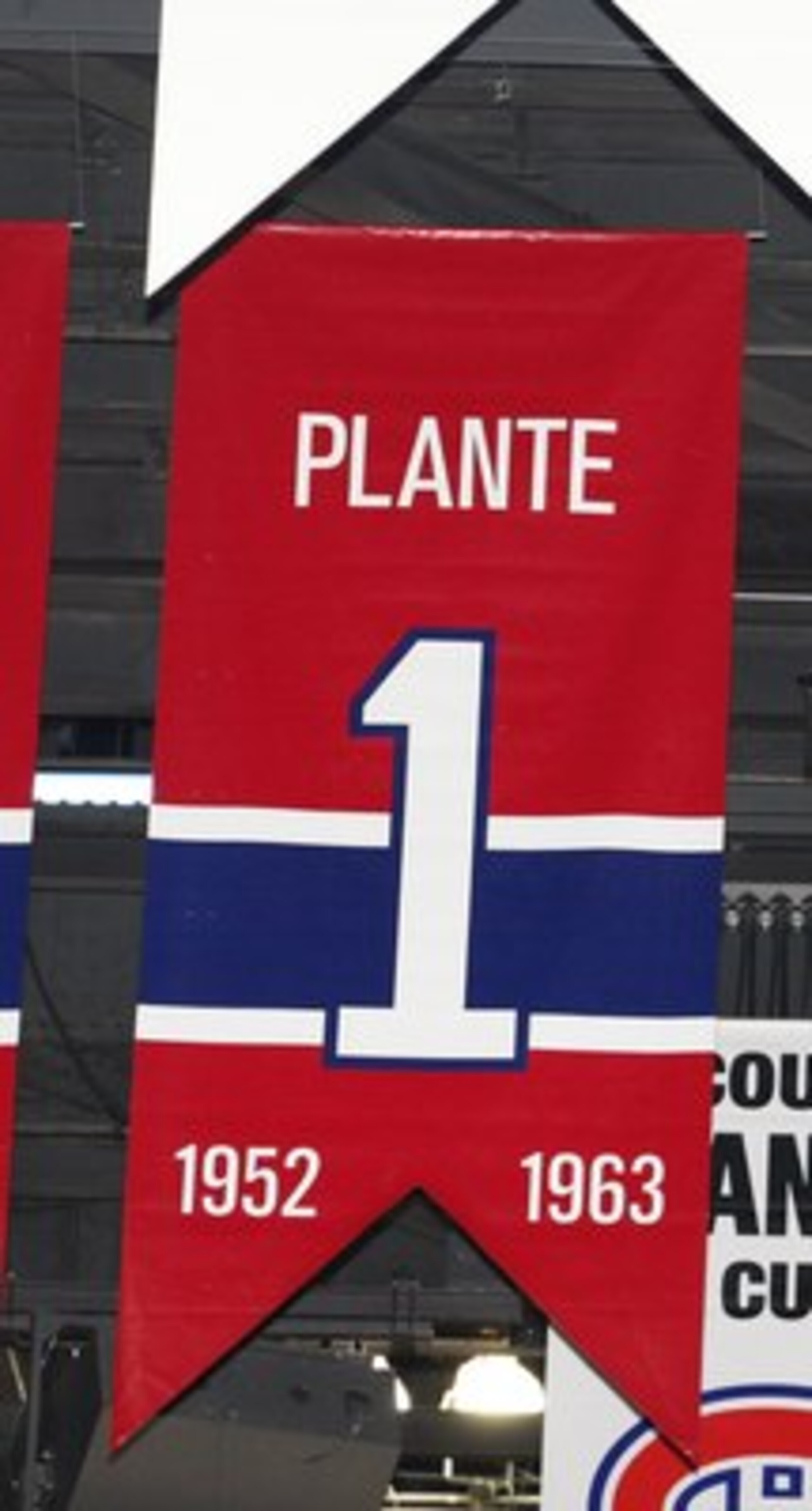 MONTREAL- APRIL 19:  A photo of the banners commemorating the retired jerseys of Jacque Plante, Bernard Geoffrion and Jean Beliveau hanging in the Bell Centre prior to Game Three of the Eastern Conference Quarterfinals between the Washington Capitals and