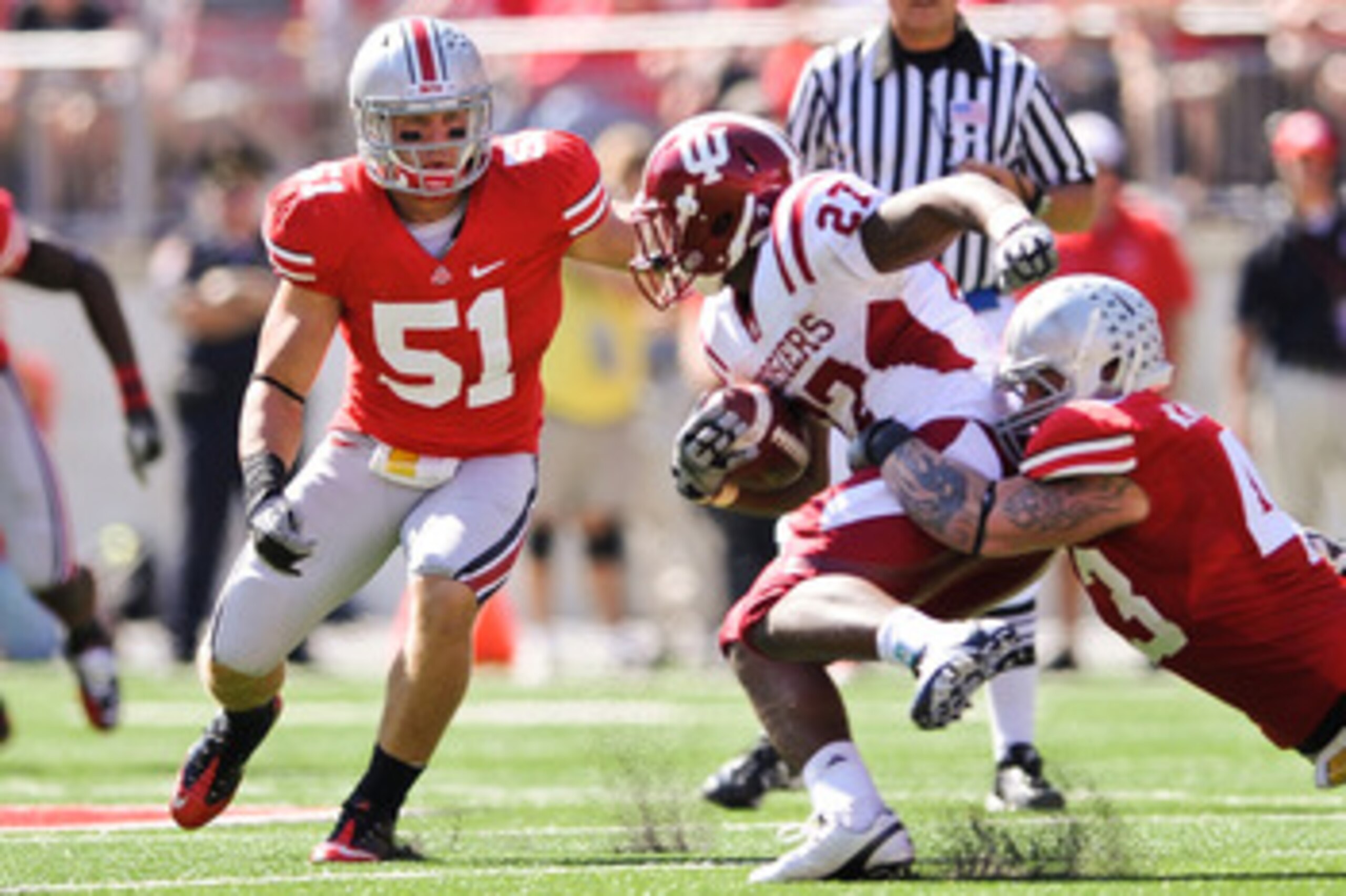 COLUMBUS, OH - OCTOBER 9:  Ross Homan #51 of the Ohio State Buckeyes moves in to assist on a tackle against the Indiana Hoosiers at Ohio Stadium on October 9, 2010 in Columbus, Ohio.  (Photo by Jamie Sabau/Getty Images)