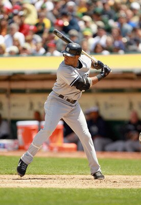 OAKLAND, CA - MAY 30:  Robinson Cano #24 of the New York Yankees bats against the Oakland Athletics at Oakland-Alameda County Coliseum on May 30, 2011 in Oakland, California.  (Photo by Ezra Shaw/Getty Images)