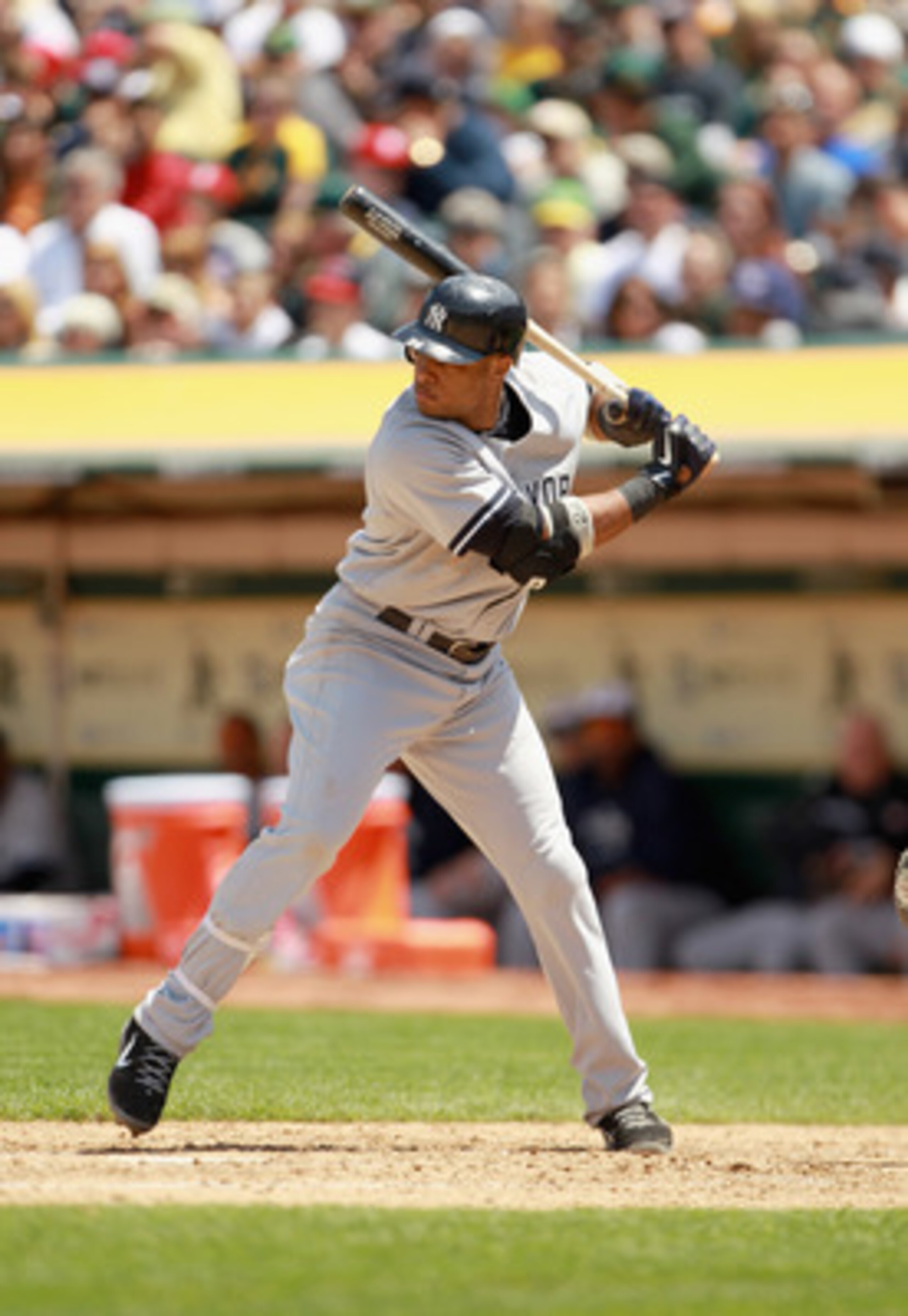 OAKLAND, CA - MAY 30:  Robinson Cano #24 of the New York Yankees bats against the Oakland Athletics at Oakland-Alameda County Coliseum on May 30, 2011 in Oakland, California.  (Photo by Ezra Shaw/Getty Images)