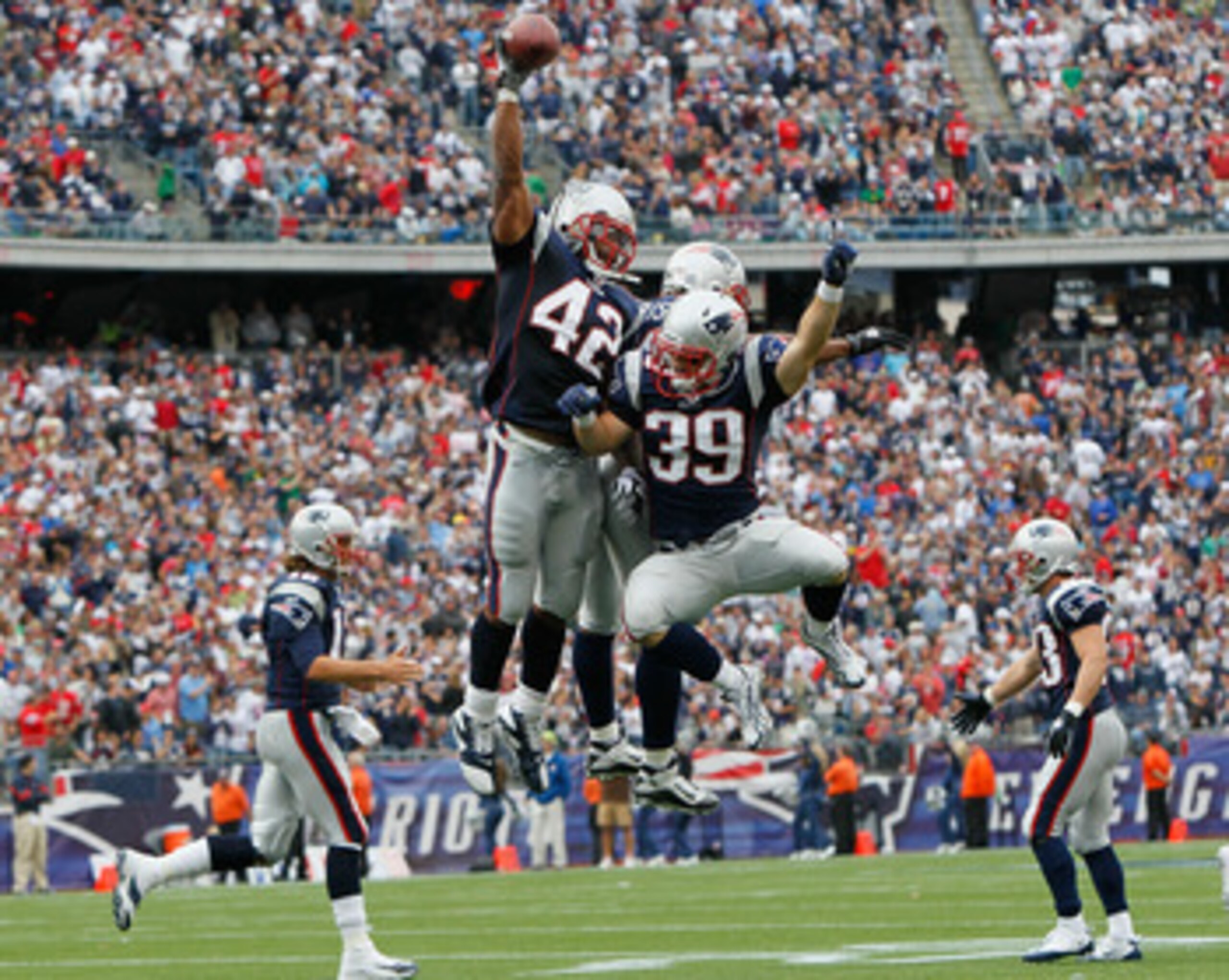 FOXBORO, MA - SEPTEMBER 26: BenJarvus Green-Elllis #42 of the New England Patriots celebrates his touchdown with teammates Sammy Morris #34 and Danny Woodhead #39 in the second half against the Buffalo Bills at Gillette Stadium in the second half on Septe